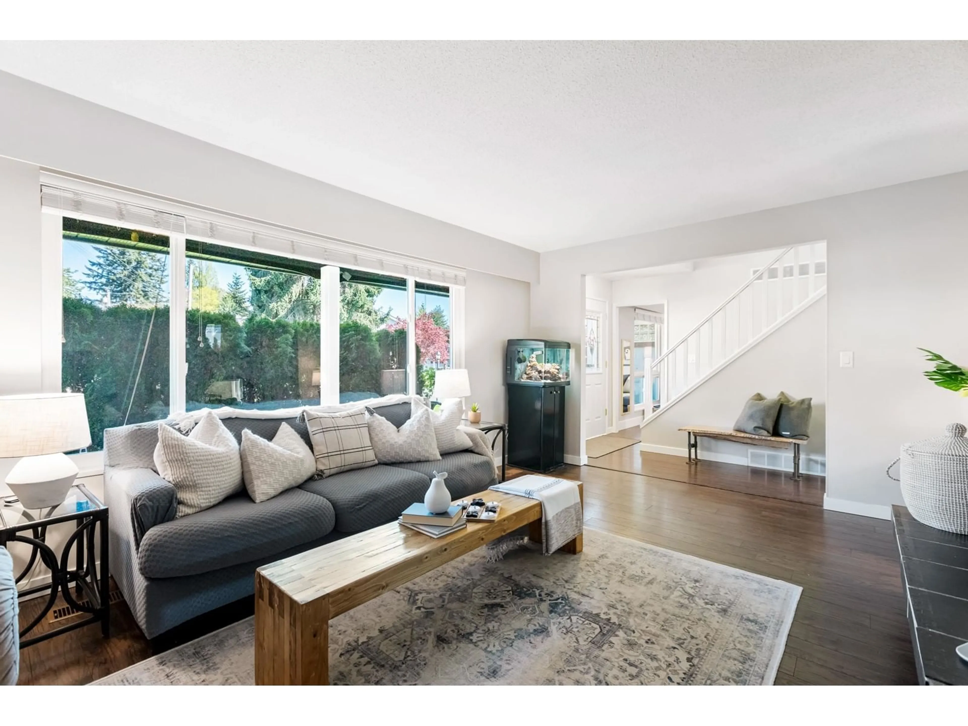 Living room with furniture, wood/laminate floor for 7507 W MINSTER DRIVE, Delta British Columbia V4C4L8