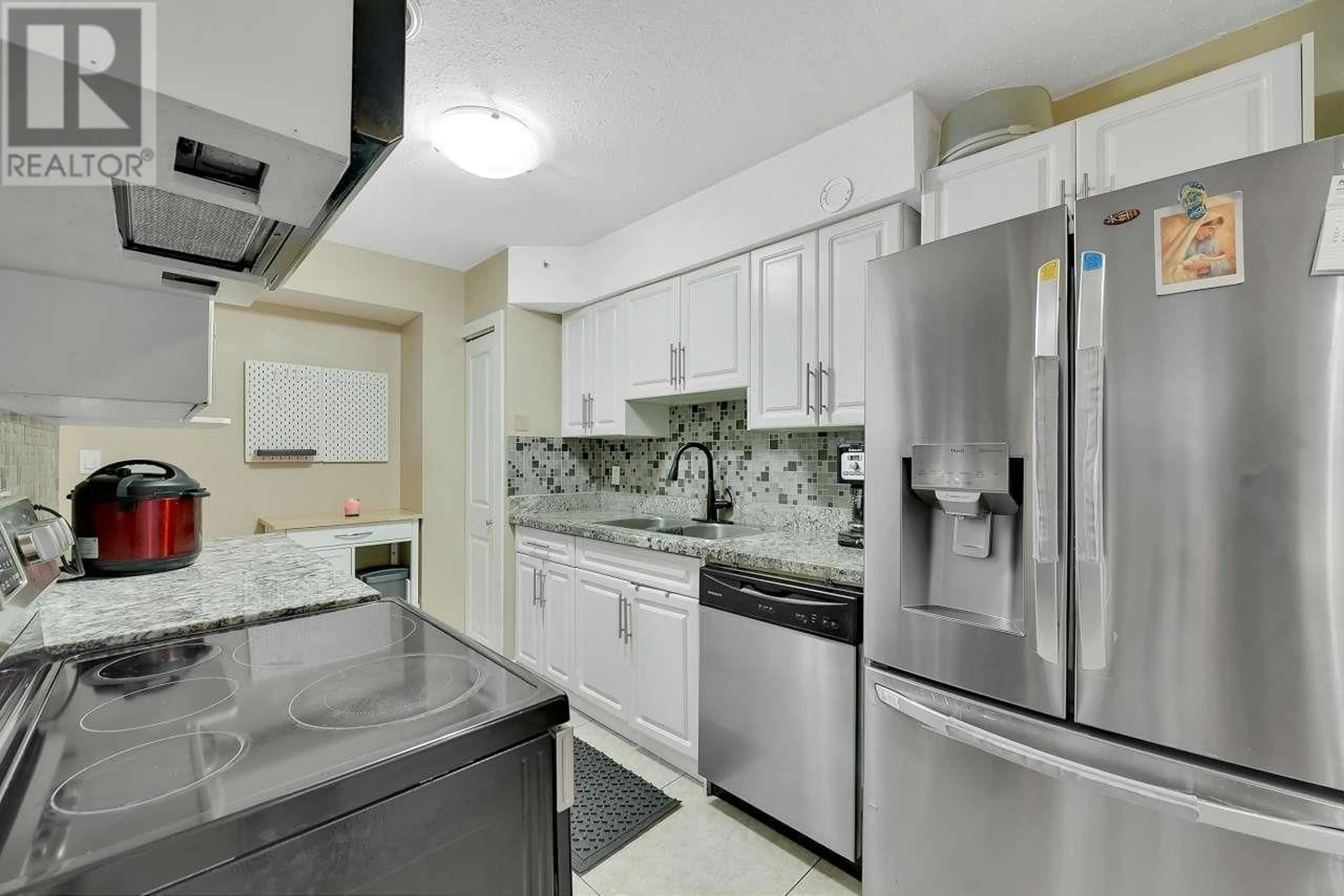 Standard kitchen, ceramic/tile floor for 133 3469 E 49TH AVENUE, Vancouver British Columbia V5S1M3