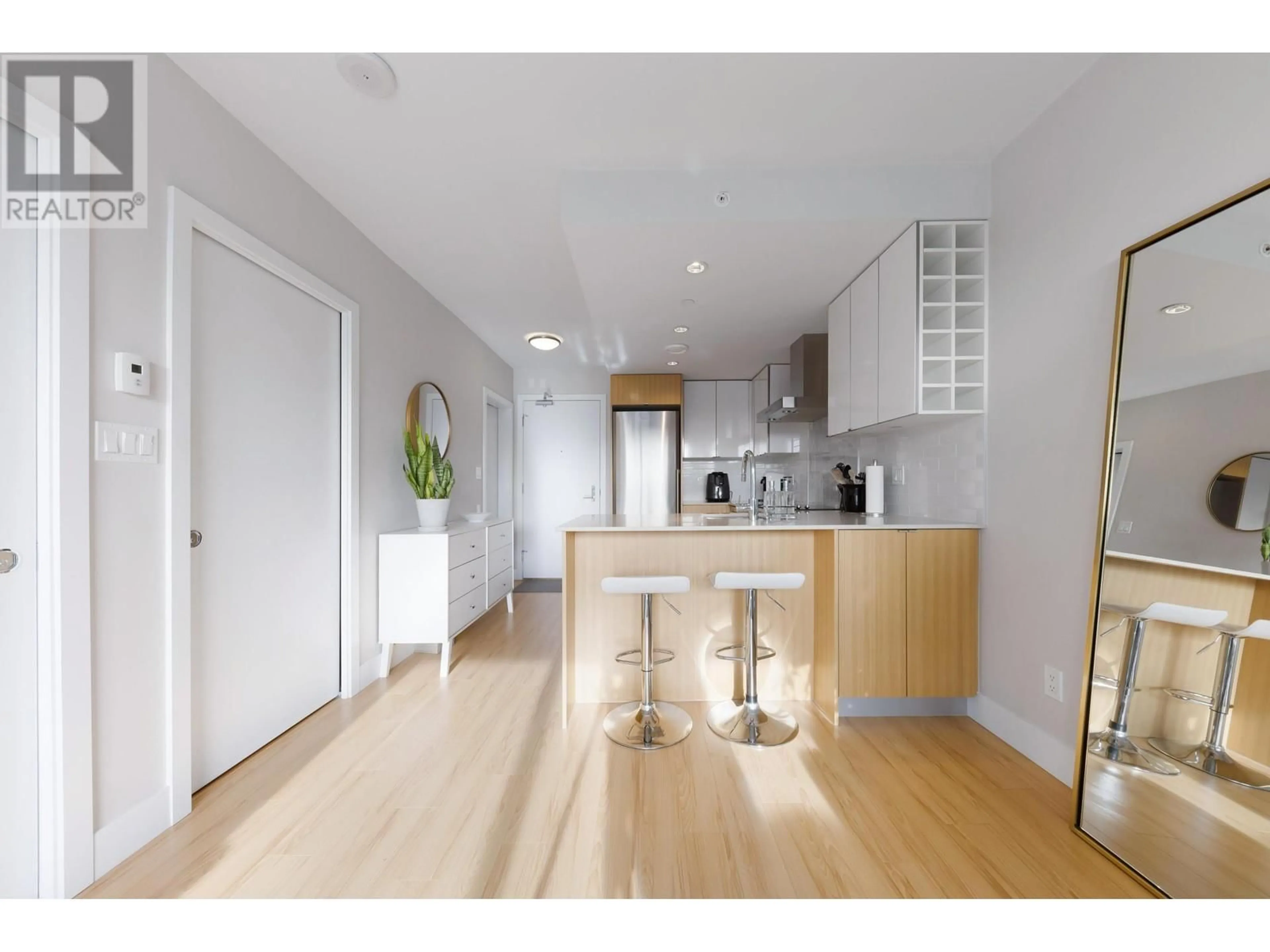 Open concept kitchen, wood/laminate floor for 616 159 W 2ND AVENUE, Vancouver British Columbia V5Y0L8