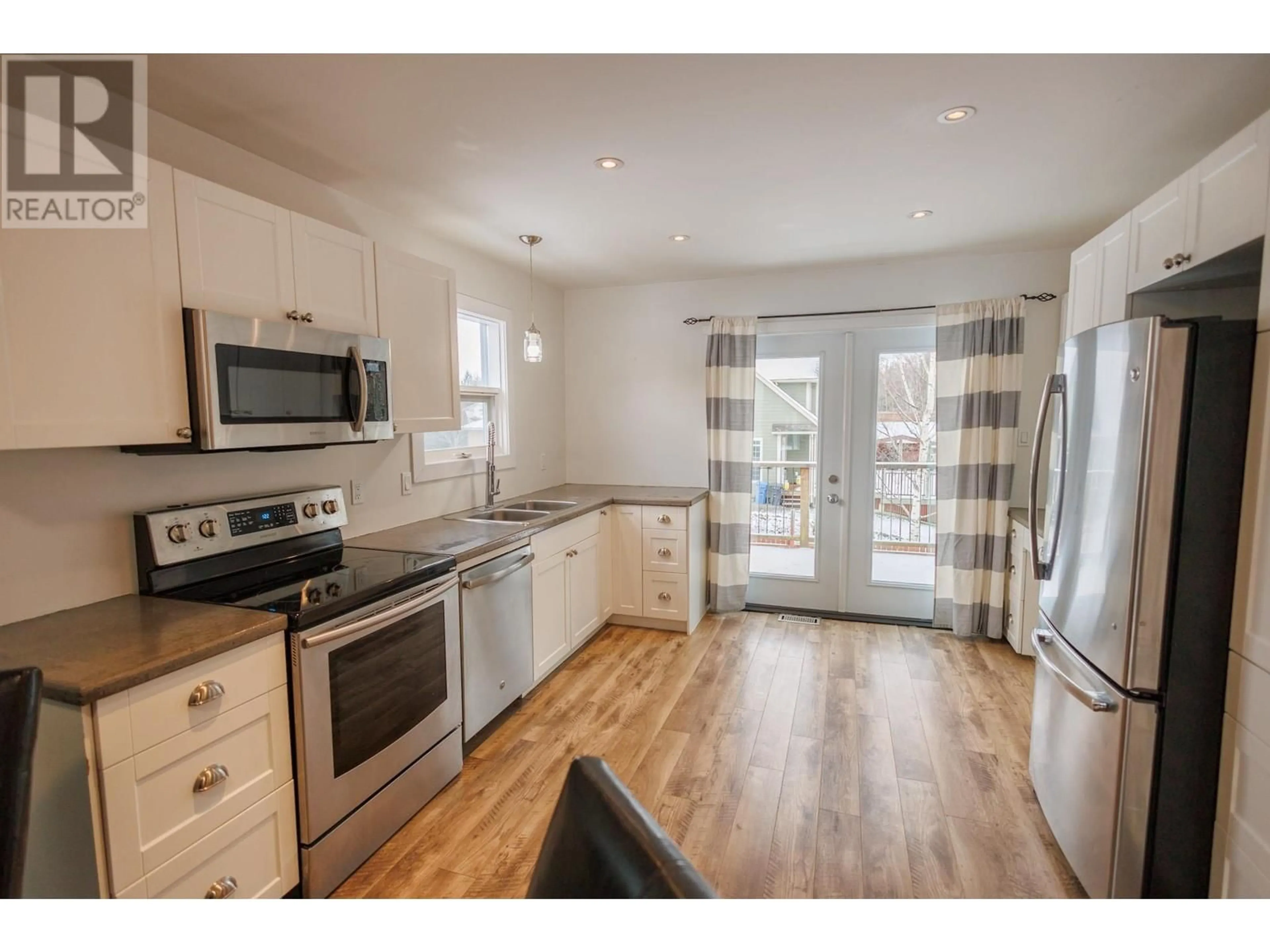 Open concept kitchen, unknown for 2407 A KENNEY STREET, Terrace British Columbia V8G3E2