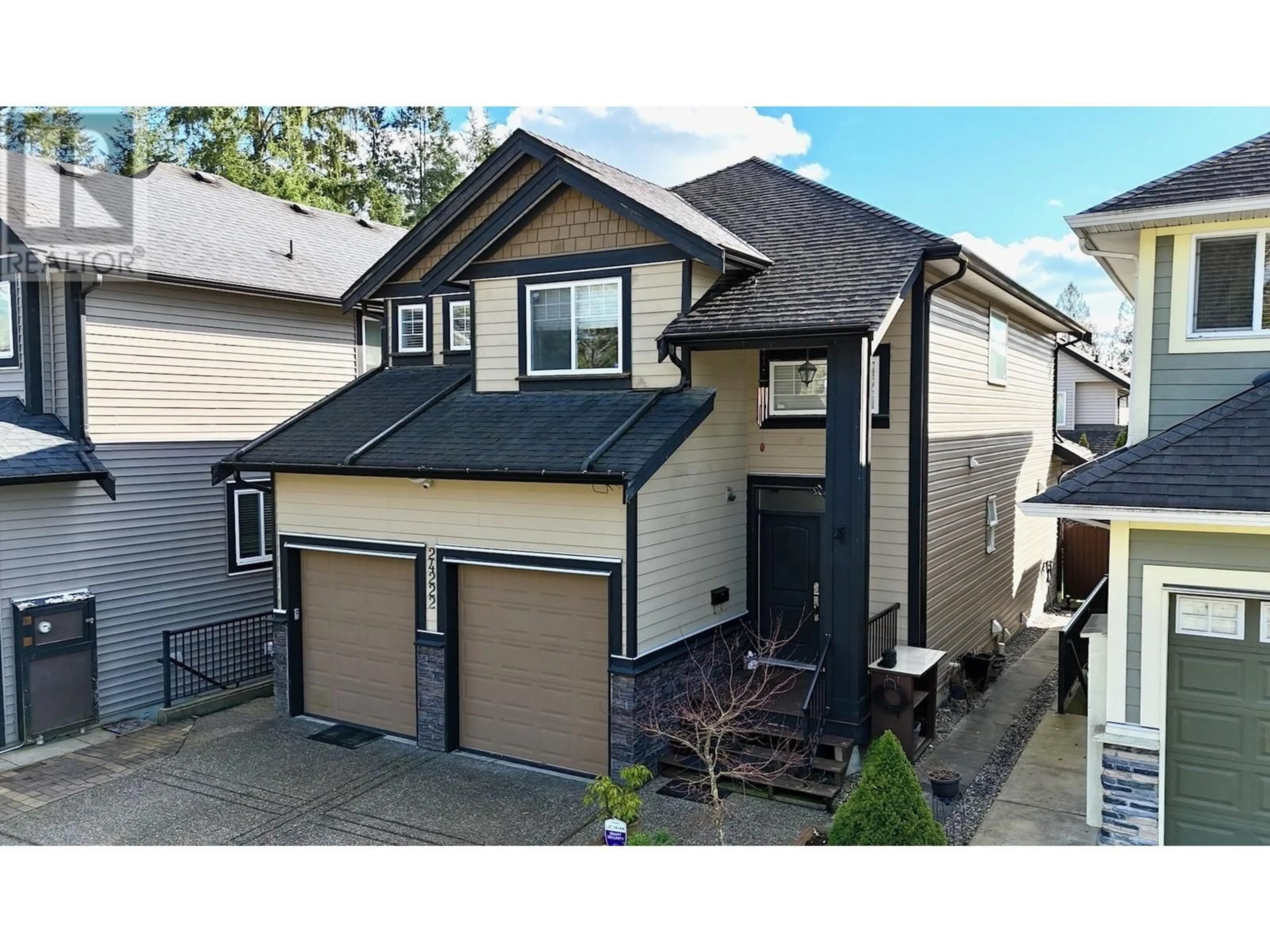 Home with vinyl exterior material, street for 24222 104 AVENUE, Maple Ridge British Columbia V2W0E4