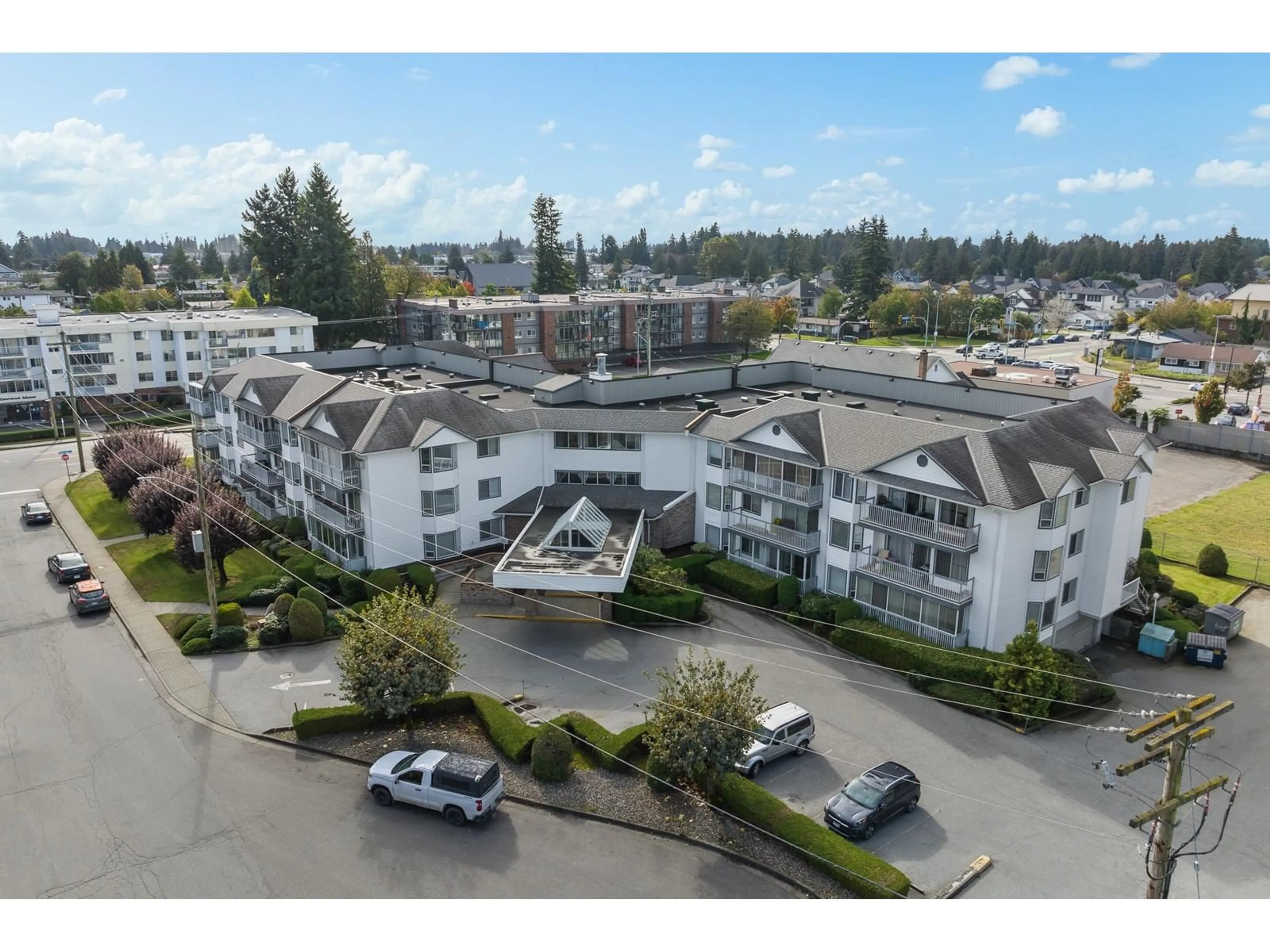 A pic from outside/outdoor area/front of a property/back of a property/a pic from drone, mountain view for 205 2425 CHURCH STREET, Abbotsford British Columbia V2T3J8