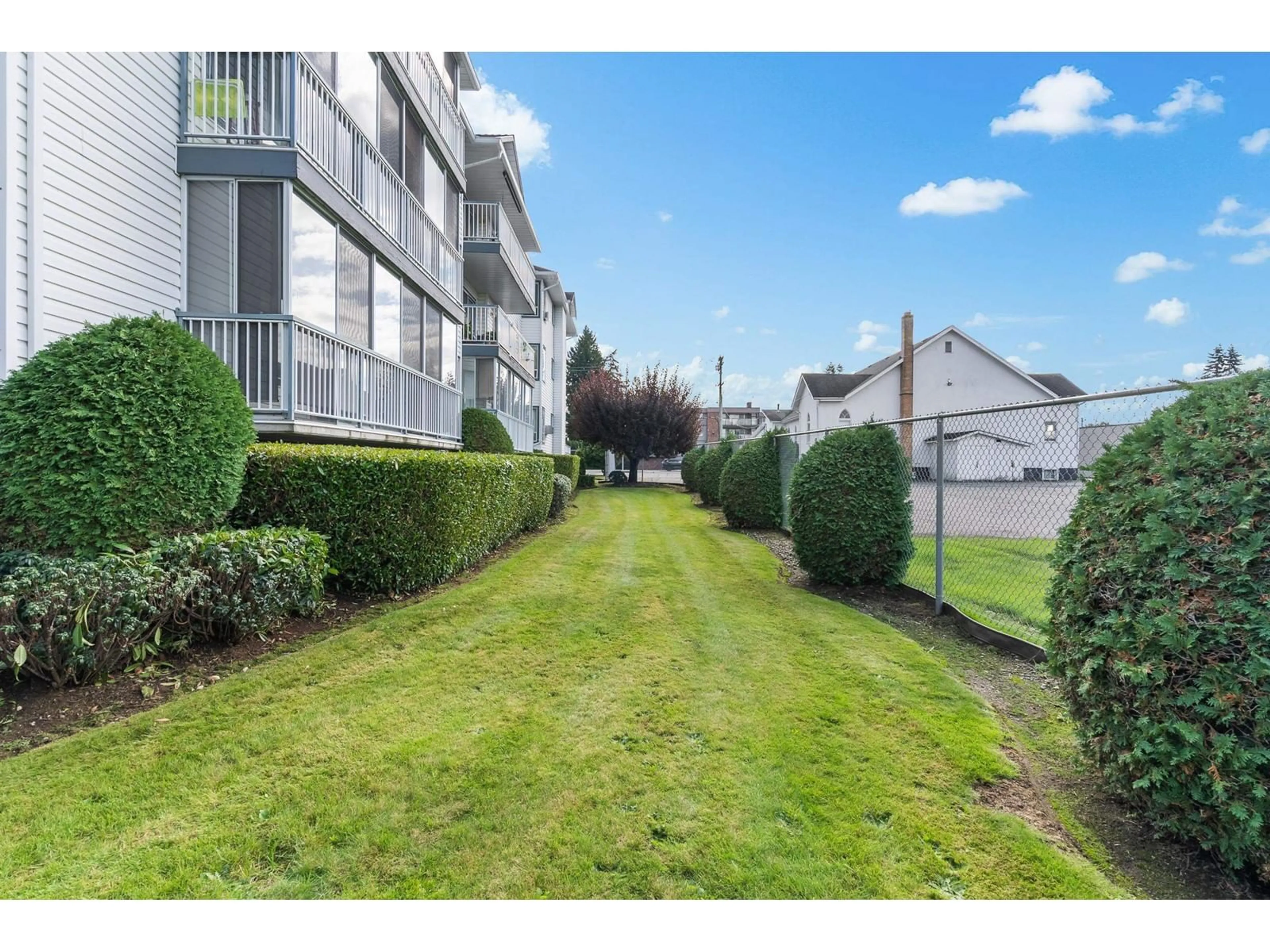 A pic from outside/outdoor area/front of a property/back of a property/a pic from drone, street for 205 2425 CHURCH STREET, Abbotsford British Columbia V2T3J8