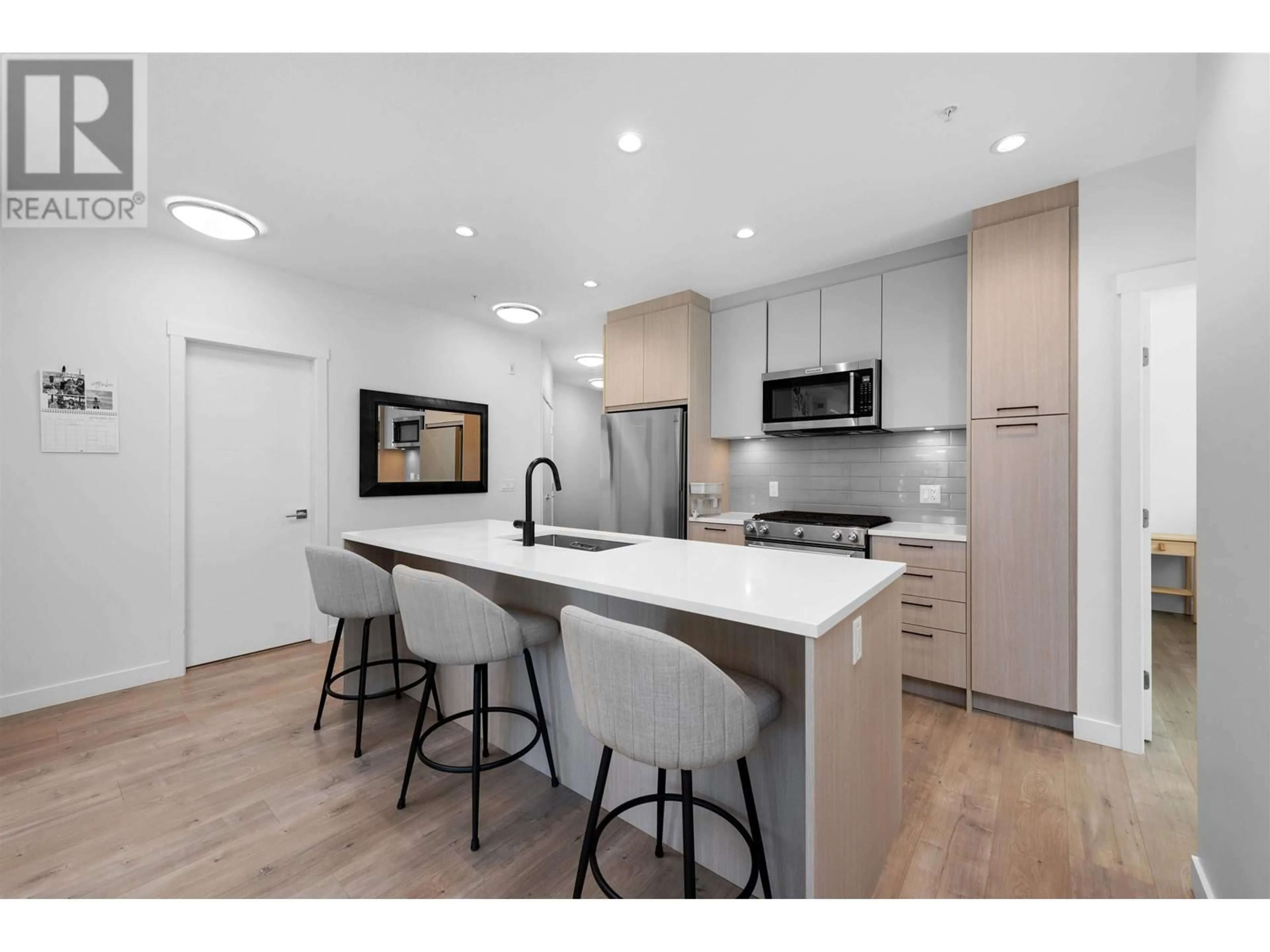 Open concept kitchen, unknown for 105 707 COMO LAKE AVENUE, Coquitlam British Columbia V3J0J5