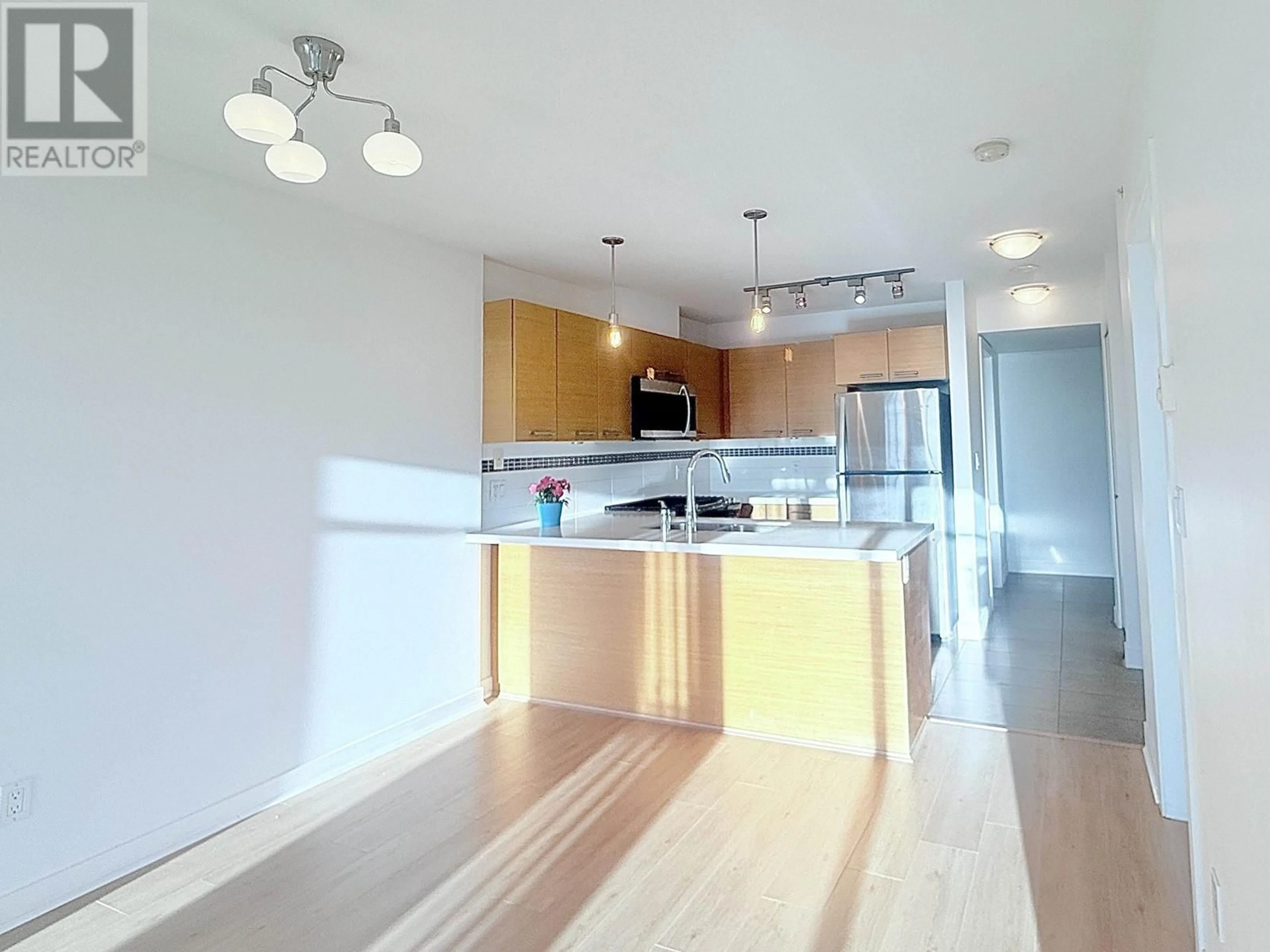 Open concept kitchen, wood/laminate floor for 1809 7090 EDMONDS STREET, Burnaby British Columbia V3N0C6