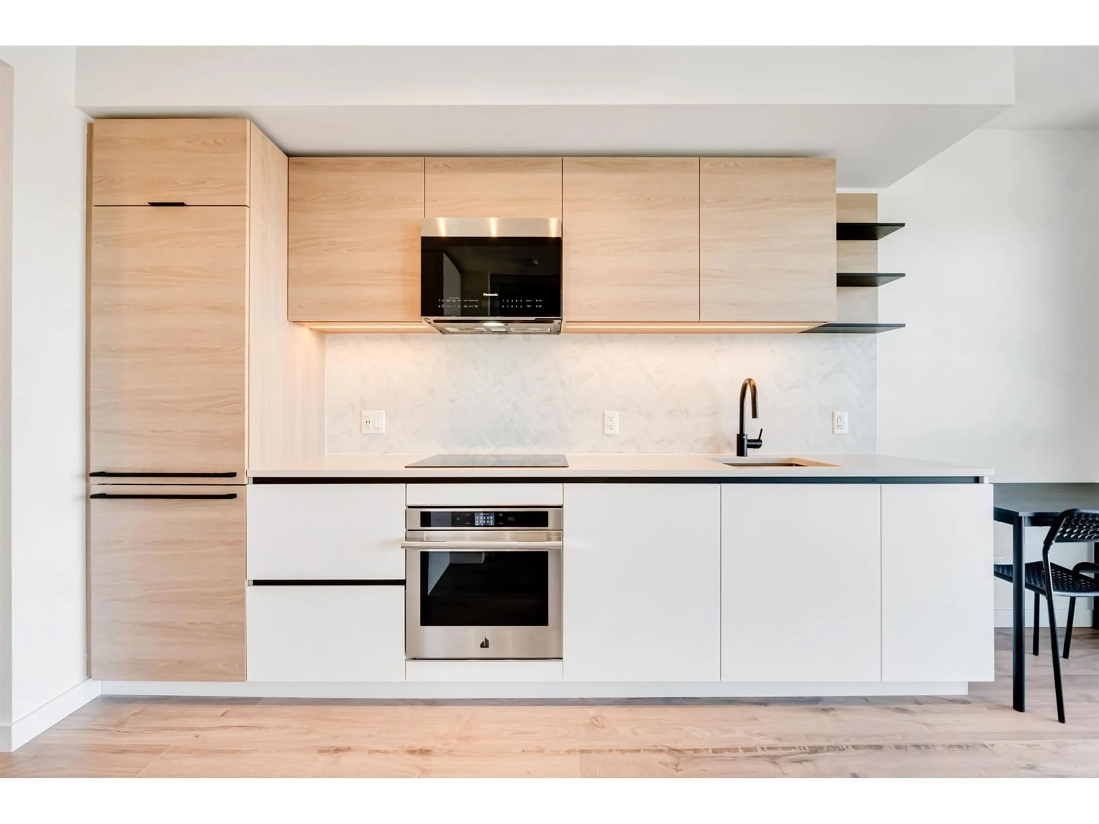 Open concept kitchen, wood/laminate floor for 3303 - 10448 UNIVERSITY, Surrey British Columbia V3T0S7