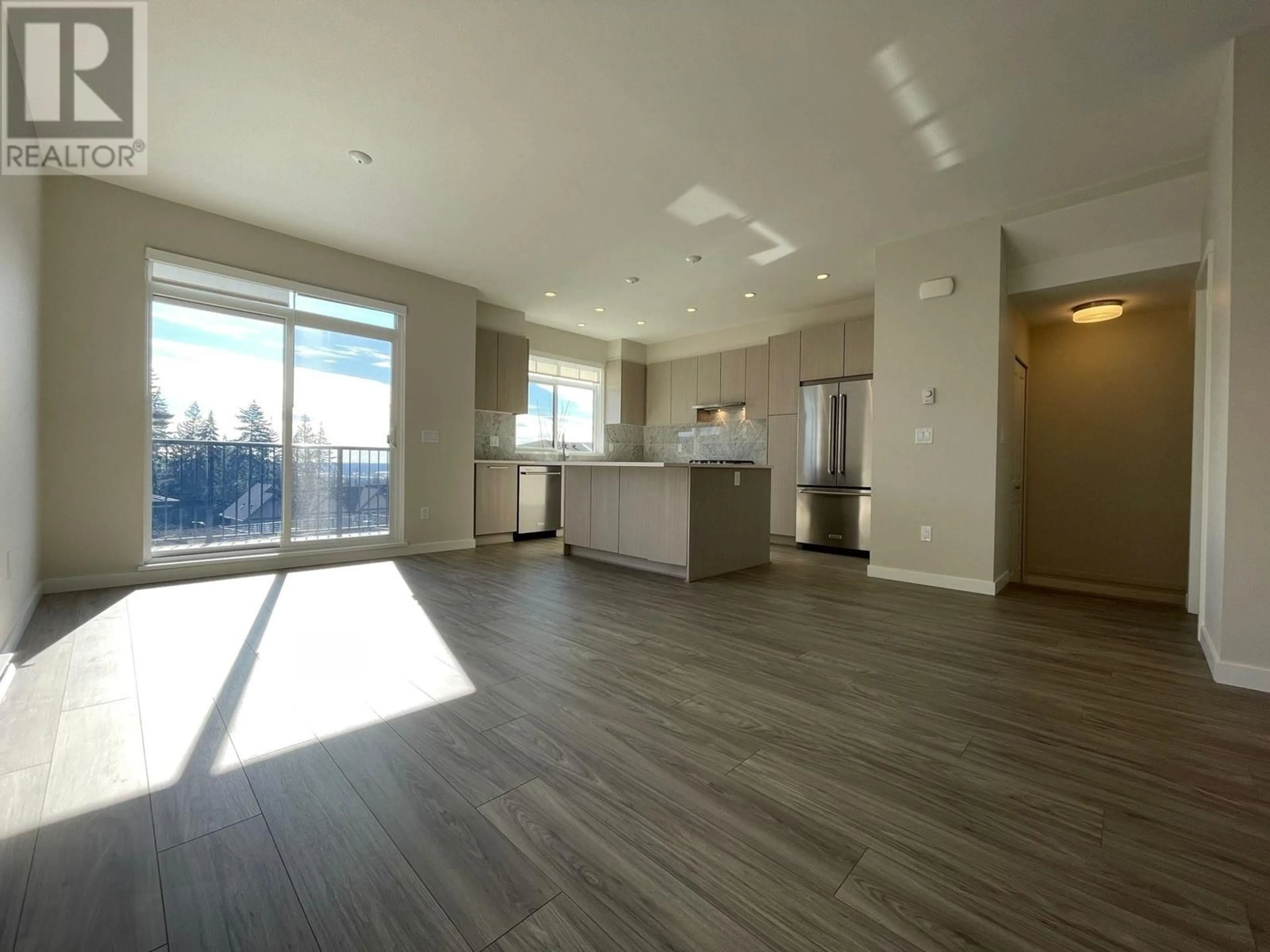 Open concept kitchen, wood/laminate floor for 112 1360 MITCHELL STREET, Coquitlam British Columbia V3E0T7