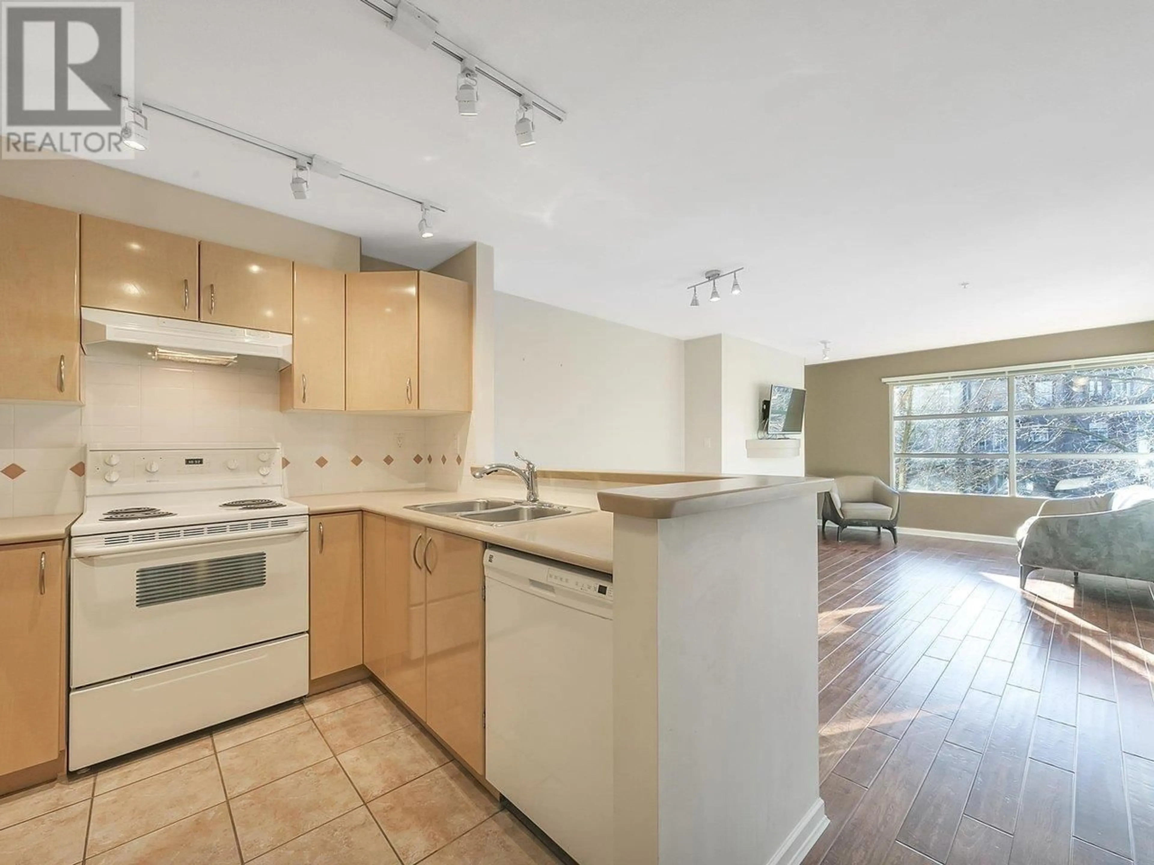 Open concept kitchen, unknown for 309 3083 W 4TH AVENUE, Vancouver British Columbia V6K1R5