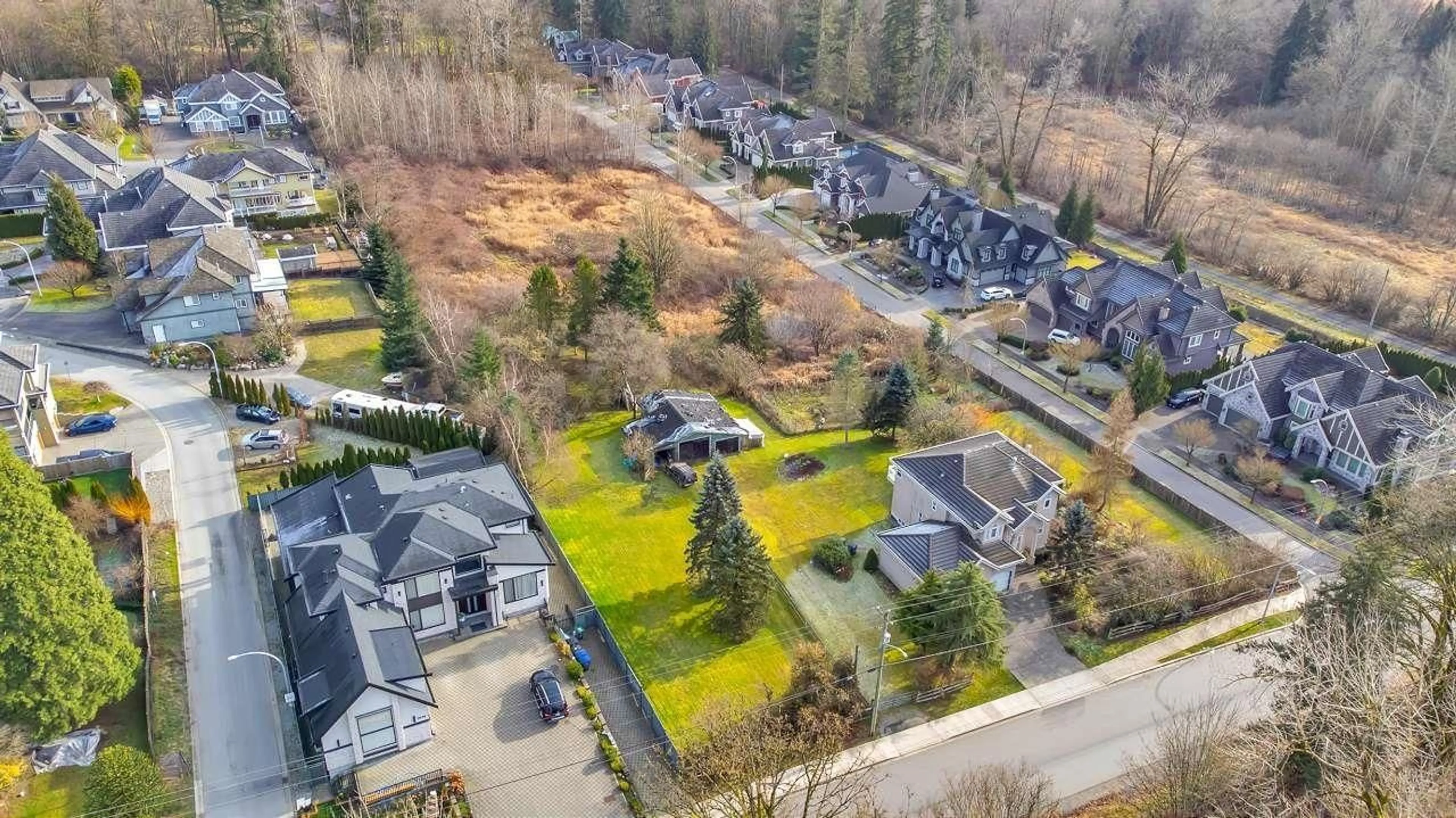 A pic from outside/outdoor area/front of a property/back of a property/a pic from drone, street for 7648 160 STREET, Surrey British Columbia V4N0T5