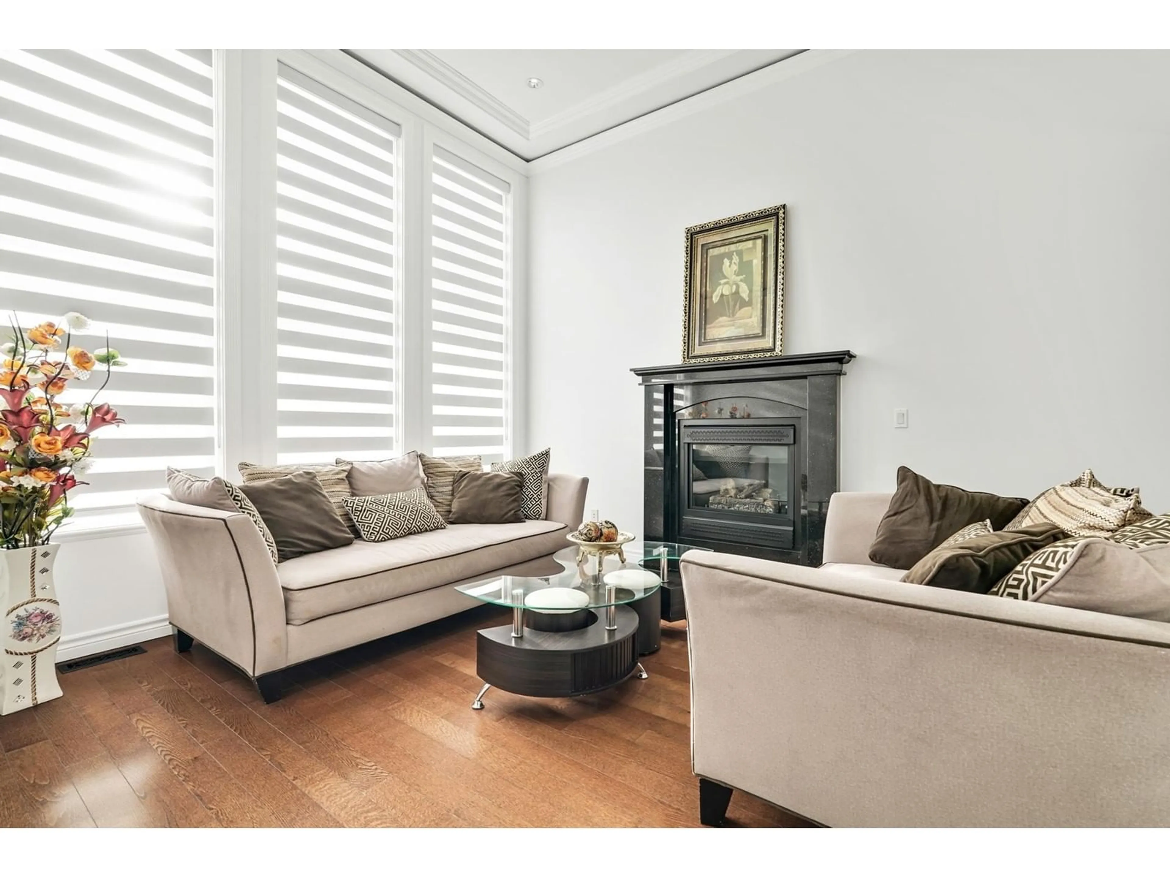 Living room with furniture, wood/laminate floor for 14867 76A AVENUE, Surrey British Columbia V3S1S3