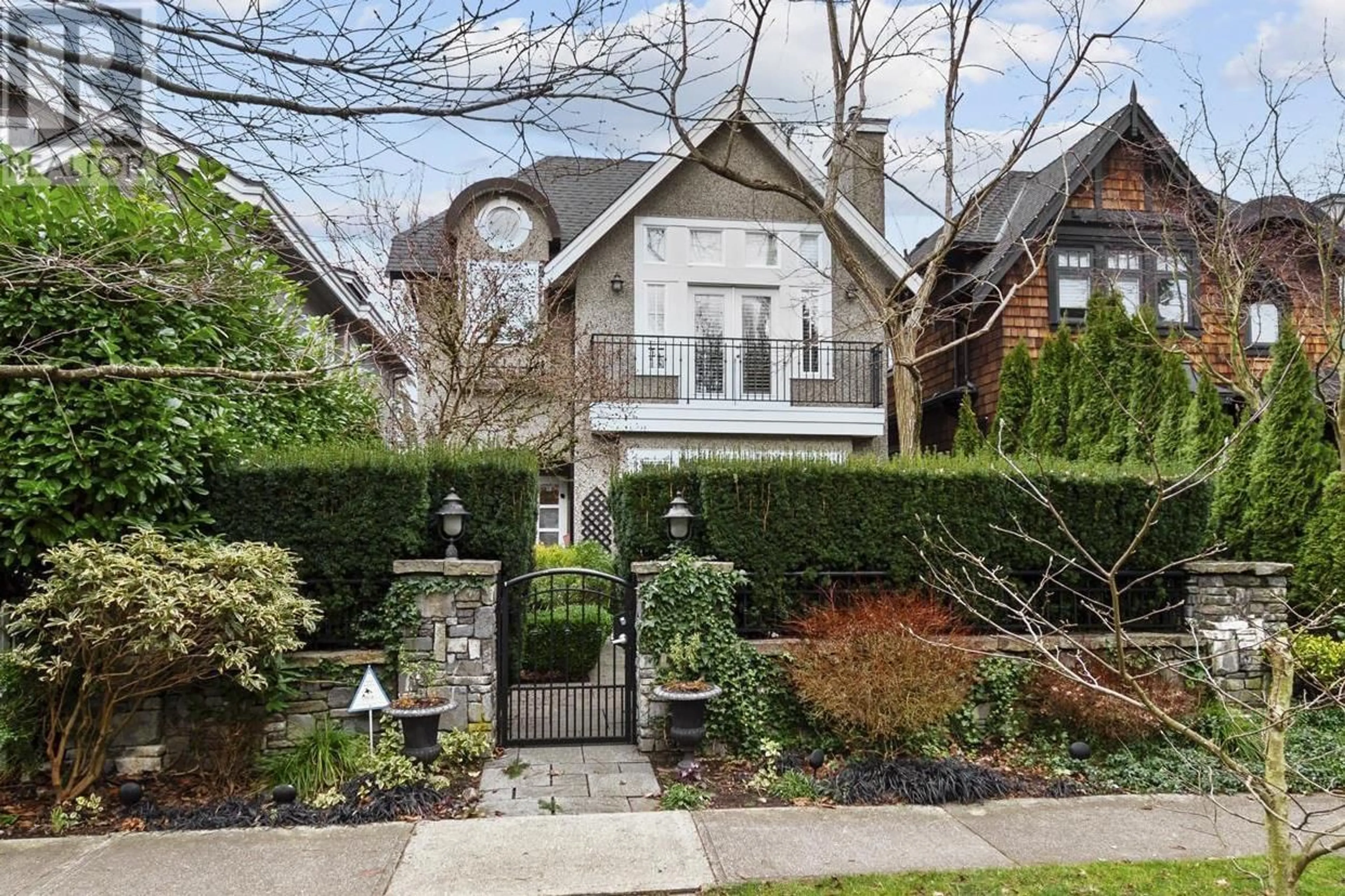 Home with brick exterior material, street for 4443 W 15TH AVENUE, Vancouver British Columbia V6R3B1