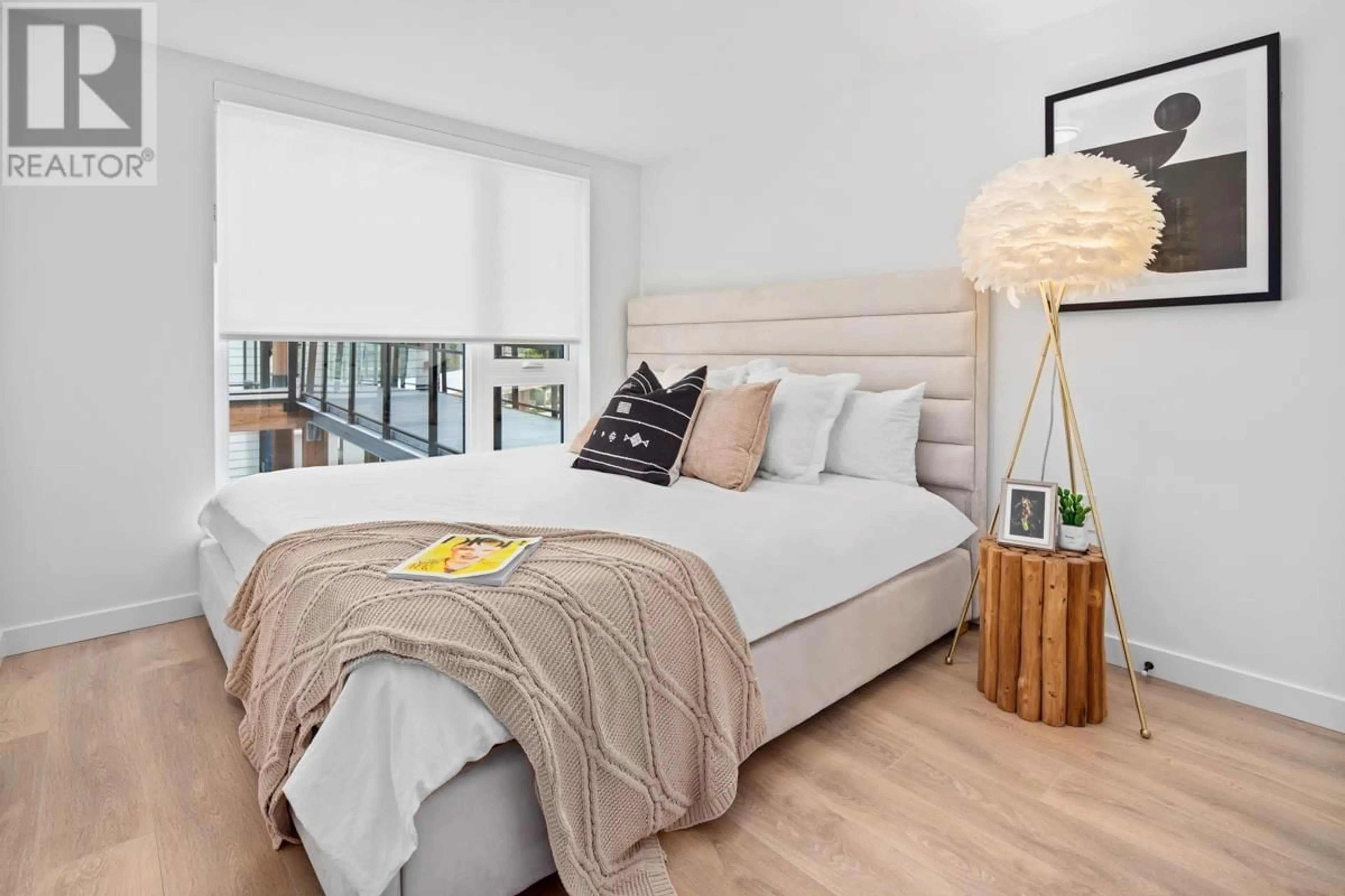 Bedroom with bed, wood/laminate floor for 353 - 555 2ND STREET, North Vancouver British Columbia V7L1E1