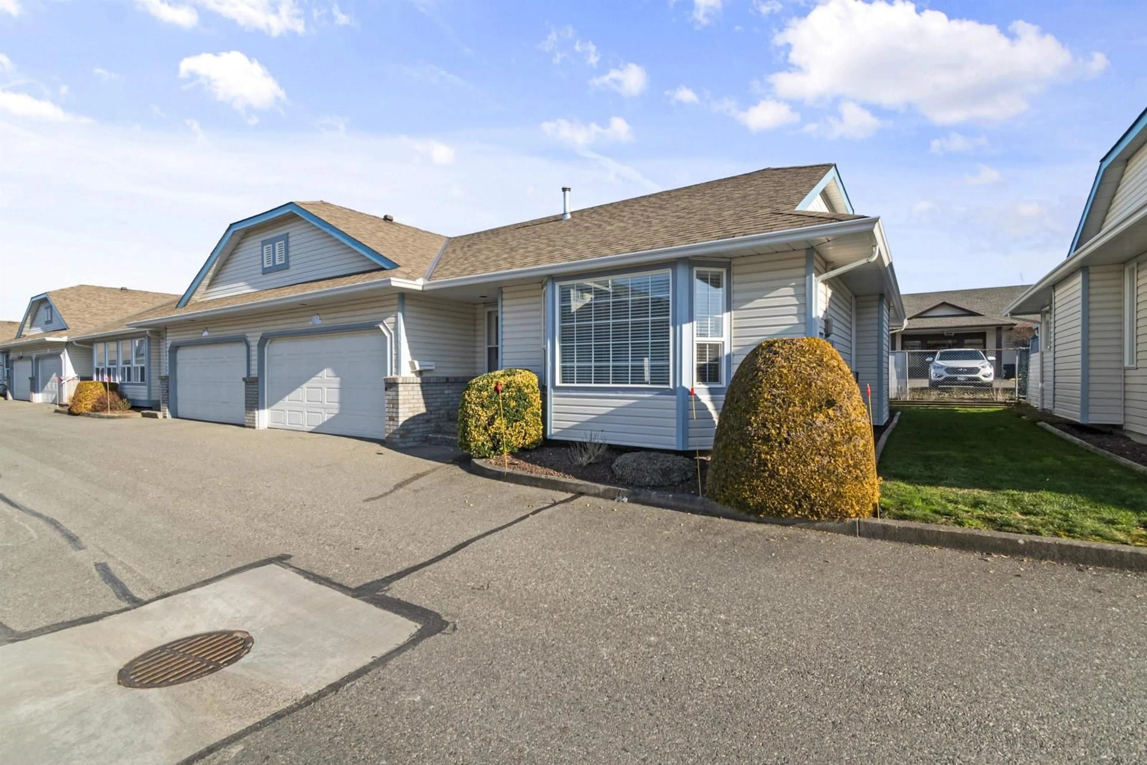 Home with vinyl exterior material, street for 64 45175 WELLS ROAD|Sardis West Vedder, Sardis British Columbia V2R3K7