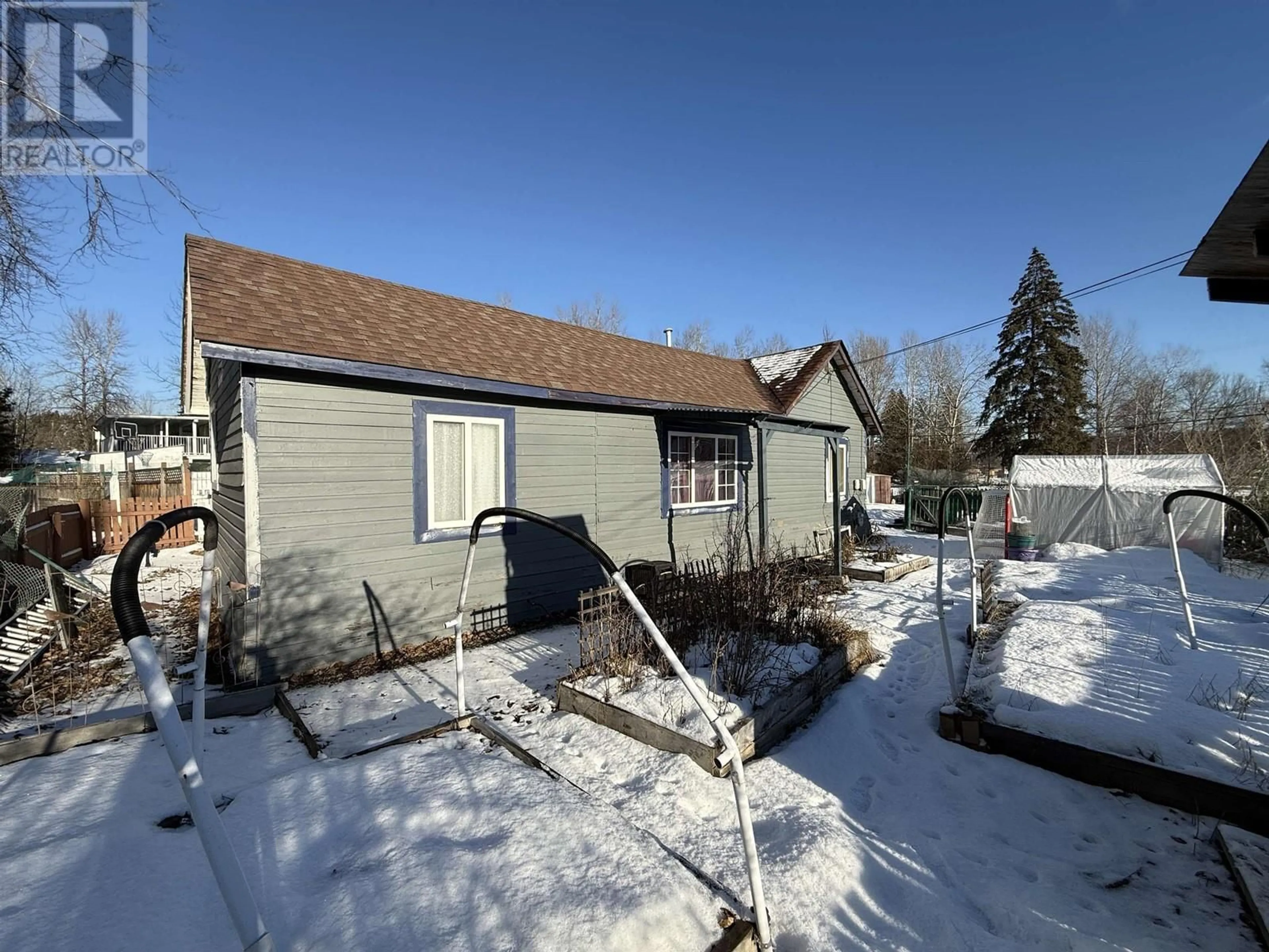 A pic from outside/outdoor area/front of a property/back of a property/a pic from drone, street for 201 LEWIS DRIVE, Quesnel British Columbia V2J1J9