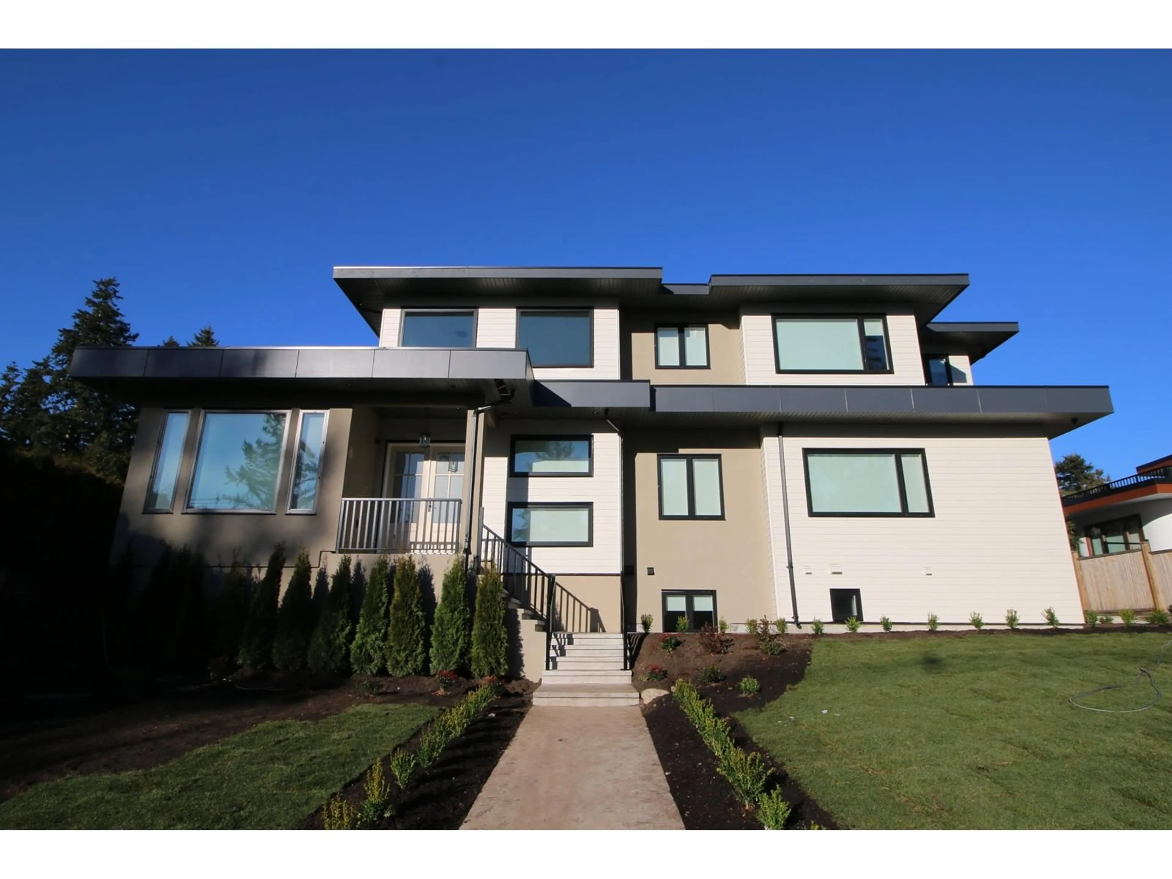 Home with vinyl exterior material, street for 13525 16TH AVENUE, Surrey British Columbia V4A9K9