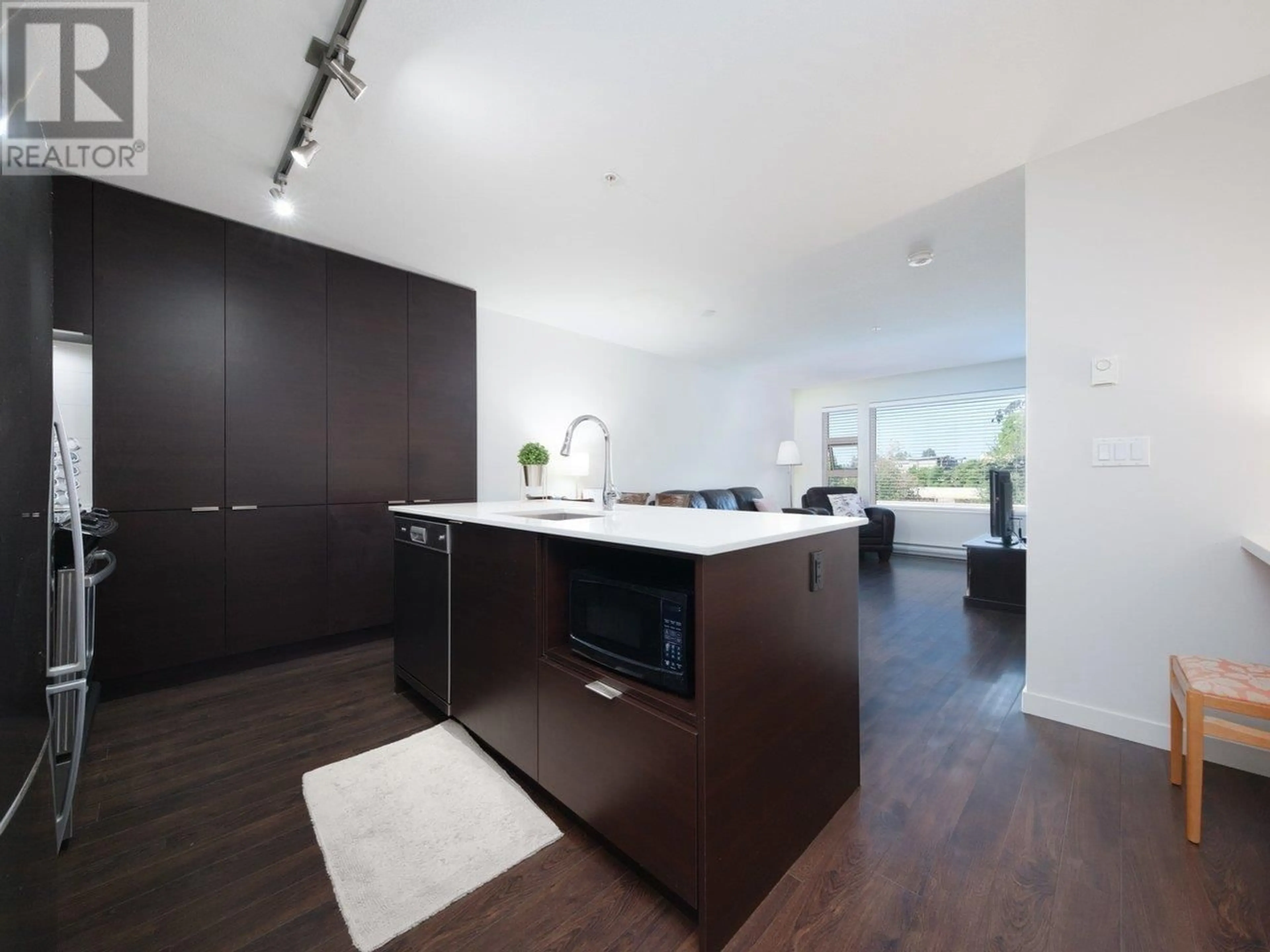 Open concept kitchen, unknown for 307 1677 LLOYD AVENUE, North Vancouver British Columbia V7P0B1