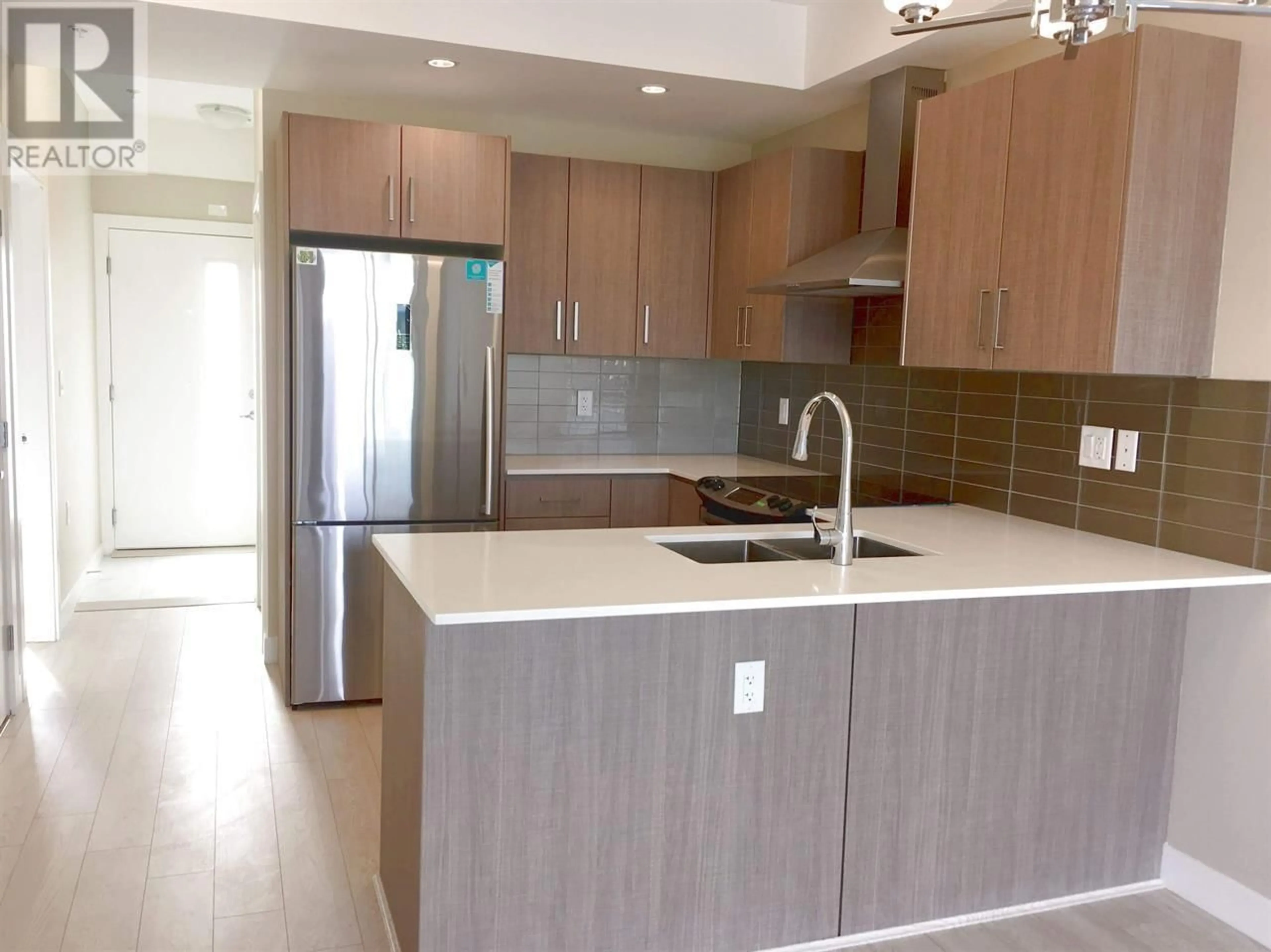 Open concept kitchen, unknown for PH16 1838 RENFREW STREET, Vancouver British Columbia V5M3H9