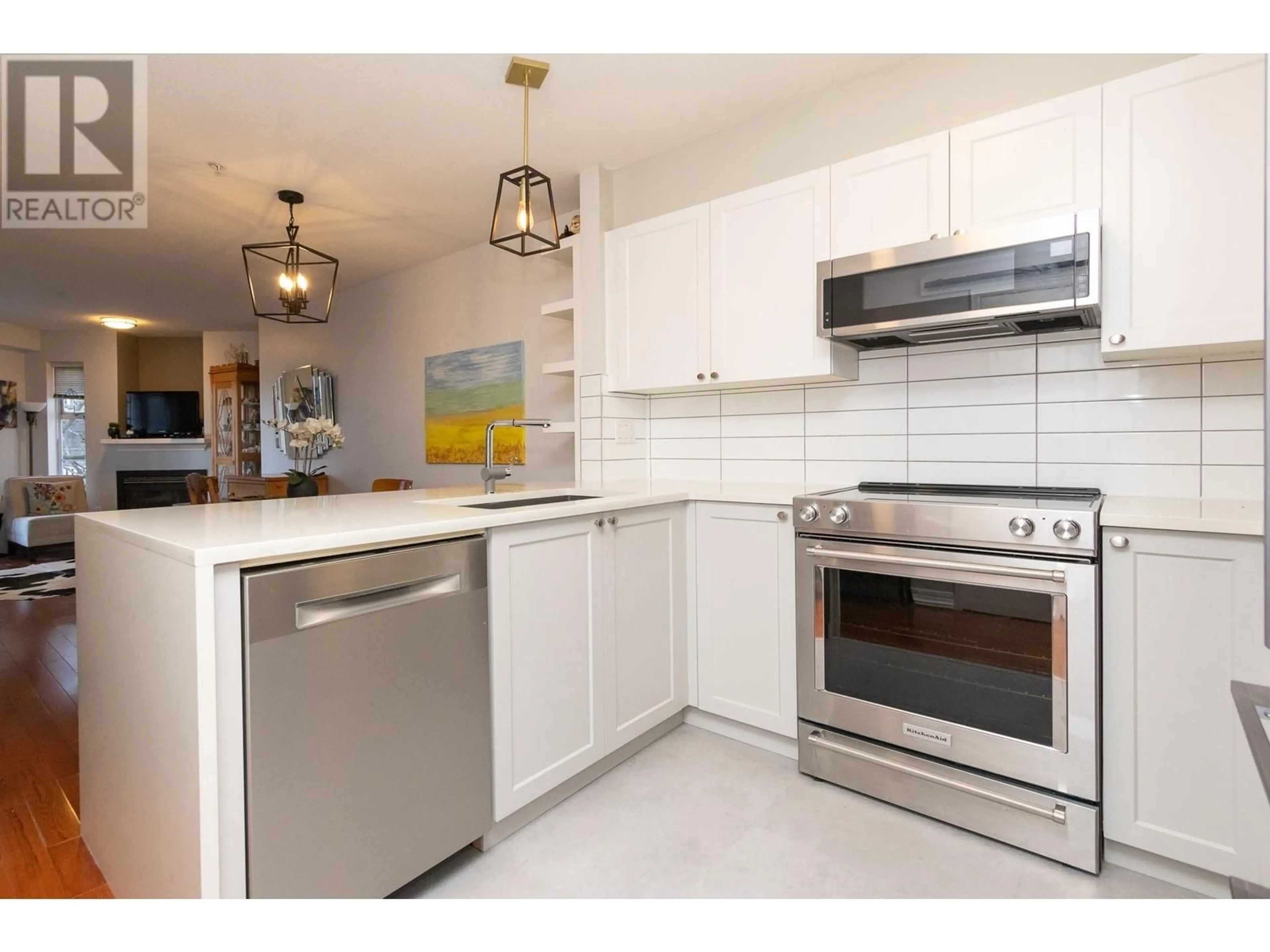 Standard kitchen, ceramic/tile floor for 215 147 E 1ST STREET, North Vancouver British Columbia V7L1B2