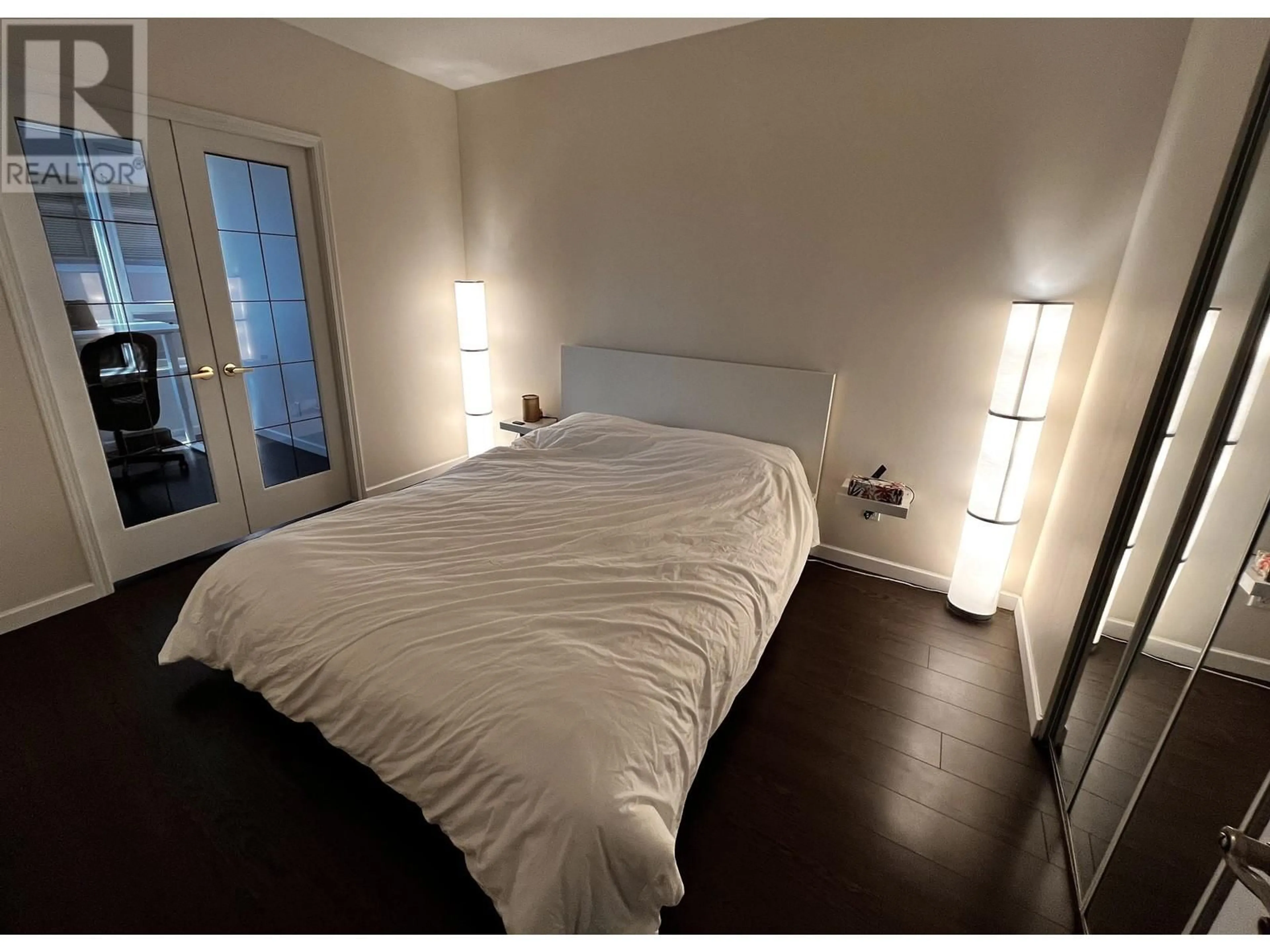 Bedroom with bed, wood/laminate floor for 709 1177 HORNBY STREET, Vancouver British Columbia V5Z2M9