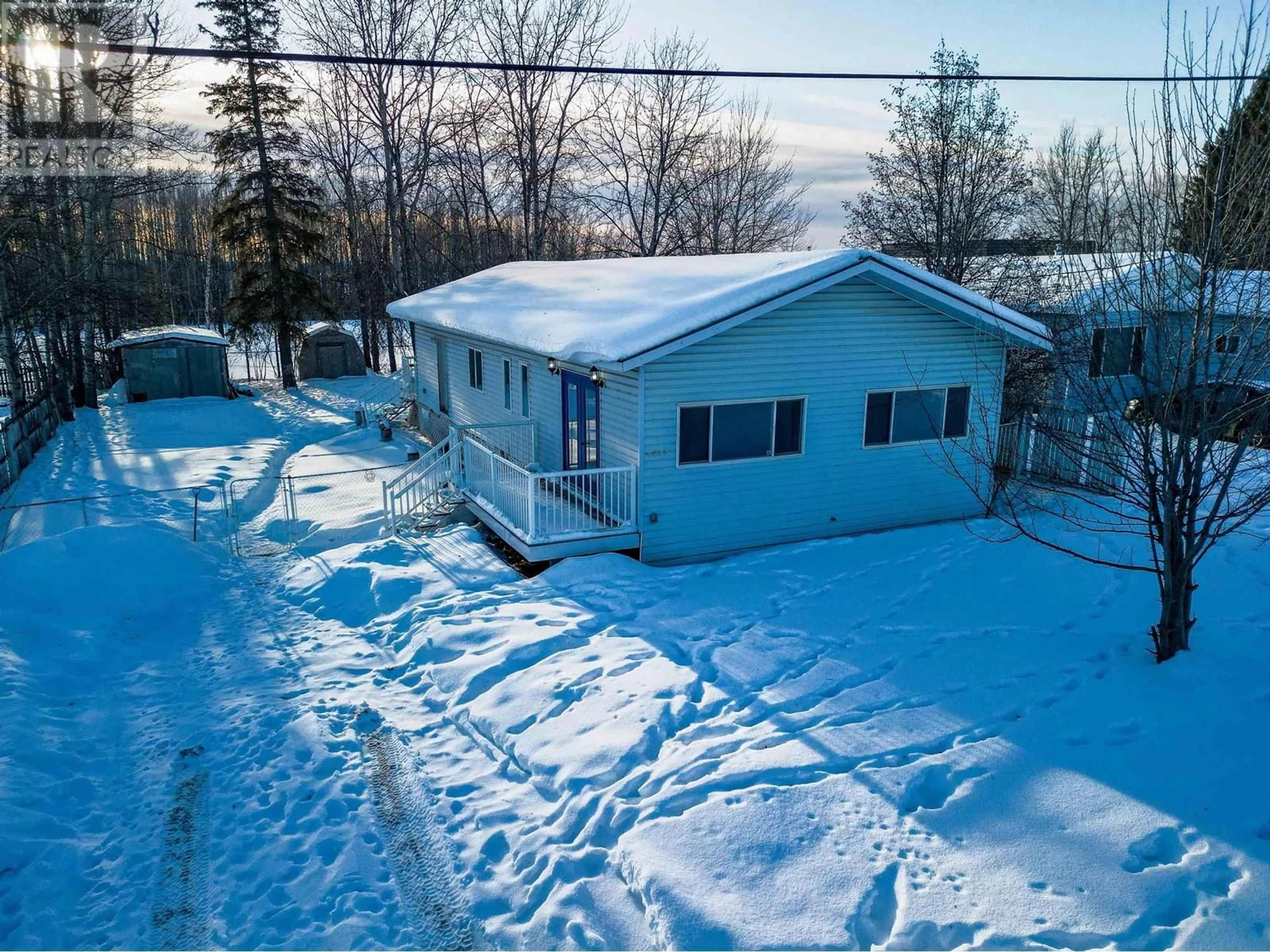 A pic from outside/outdoor area/front of a property/back of a property/a pic from drone, unknown for 4423 E 53 AVENUE, Fort Nelson British Columbia V0C1R0