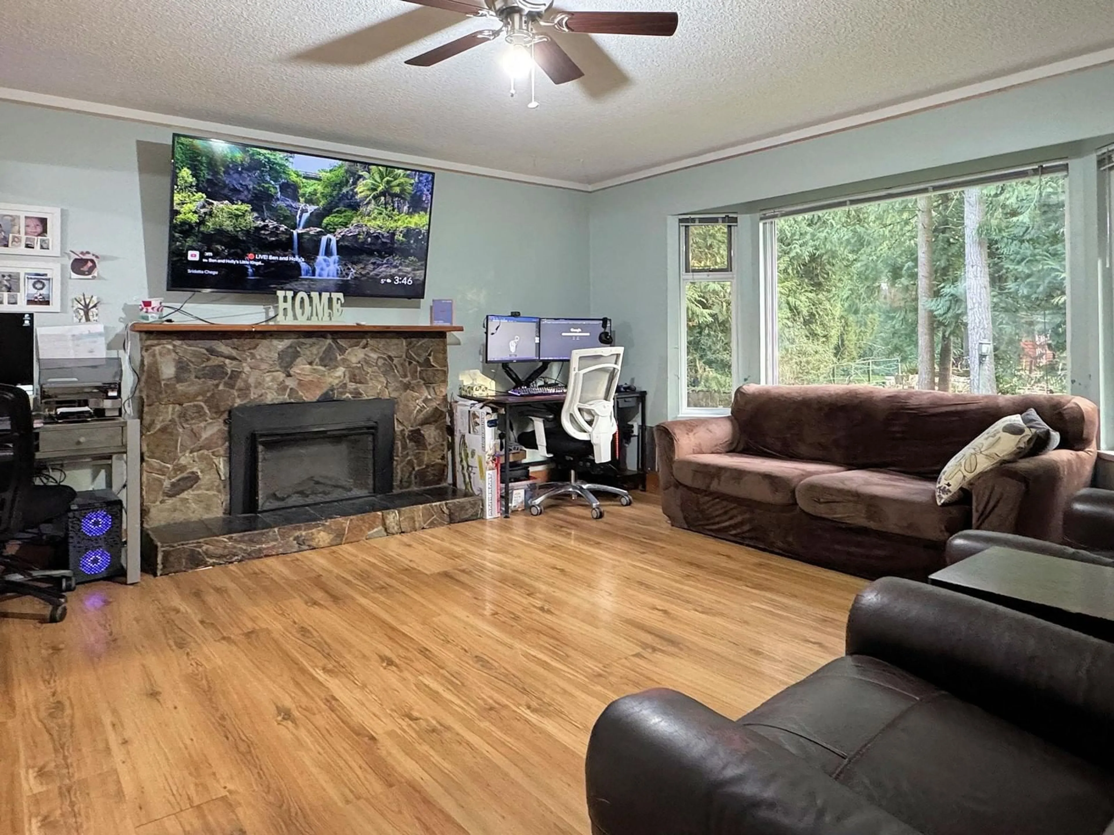 Living room with furniture, wood/laminate floor for 3890 200 STREET, Langley British Columbia V3A1K5