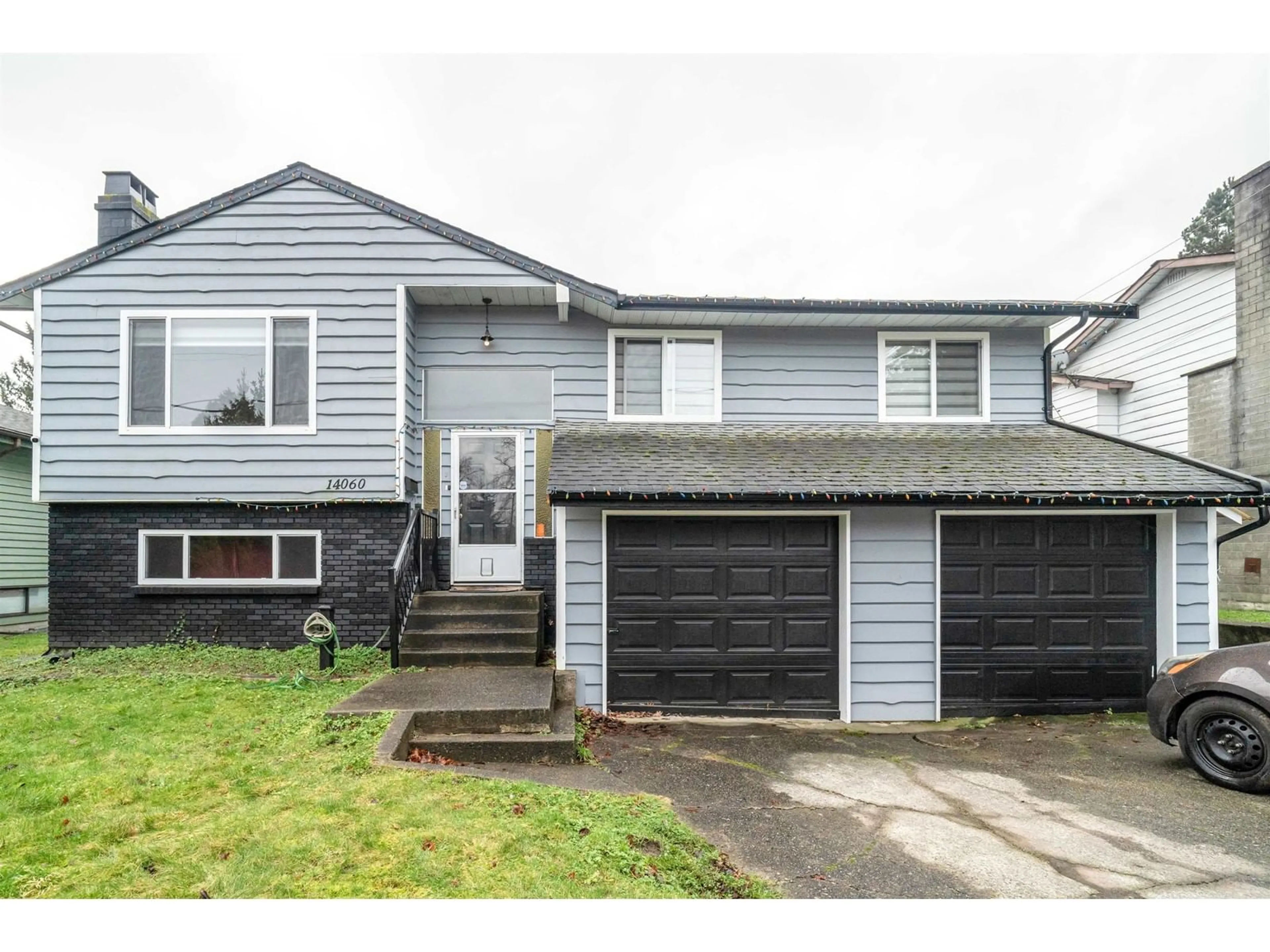 Home with vinyl exterior material, street for 14060 80 AVENUE, Surrey British Columbia V3W3C4