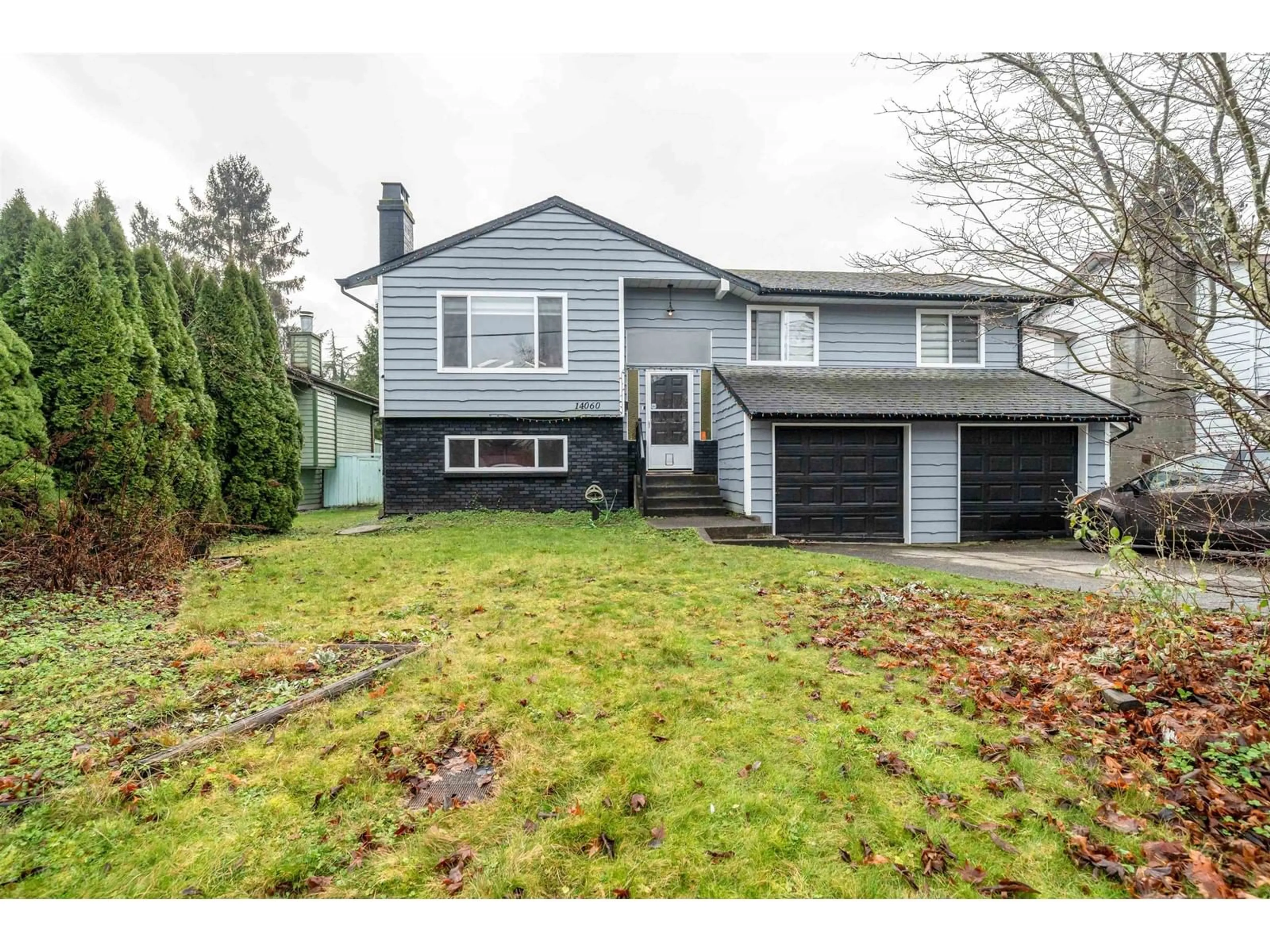 Home with vinyl exterior material, street for 14060 80 AVENUE, Surrey British Columbia V3W3C4