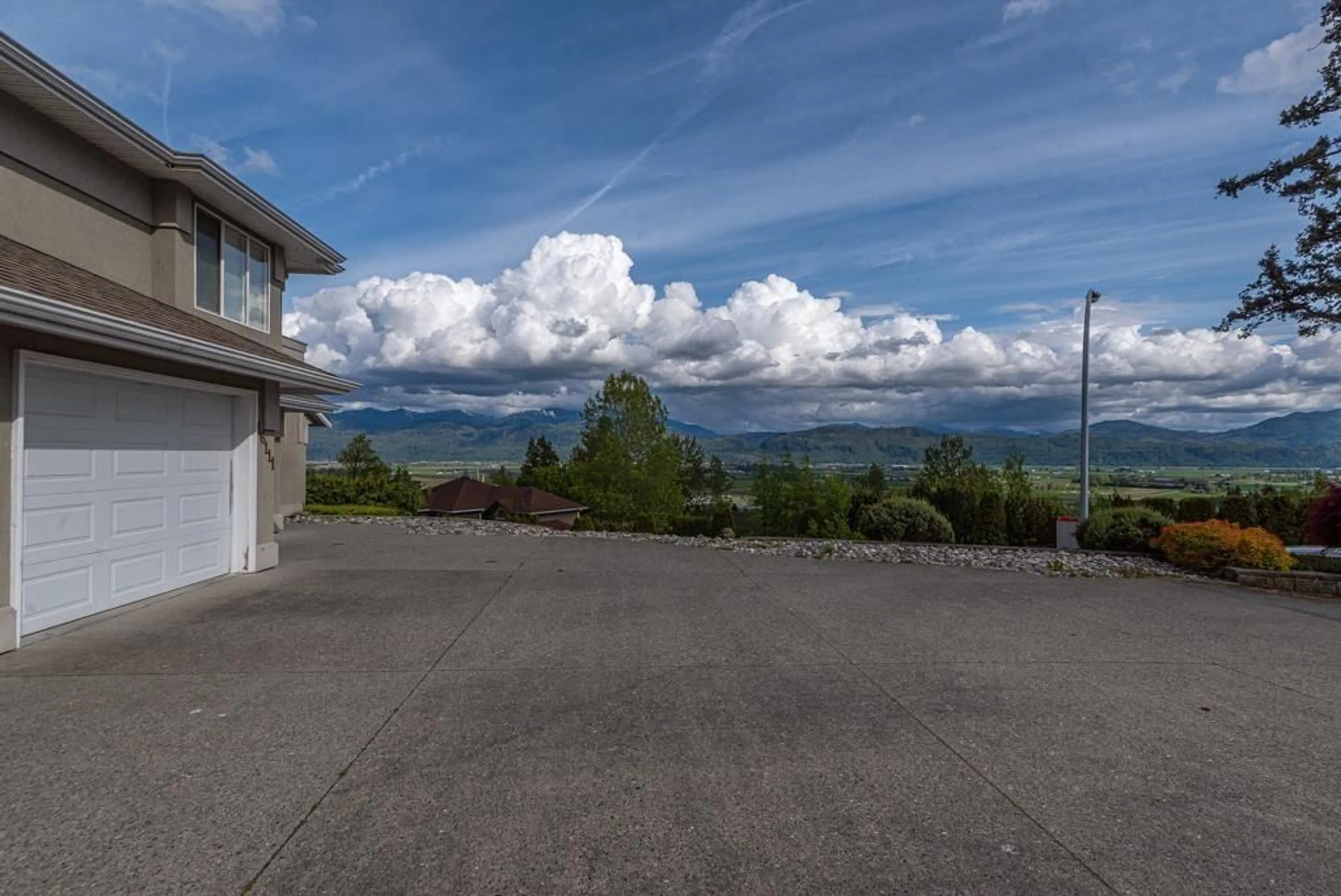 A pic from outside/outdoor area/front of a property/back of a property/a pic from drone, mountain view for 36111 SPYGLASS LANE, Abbotsford British Columbia V3G2W7