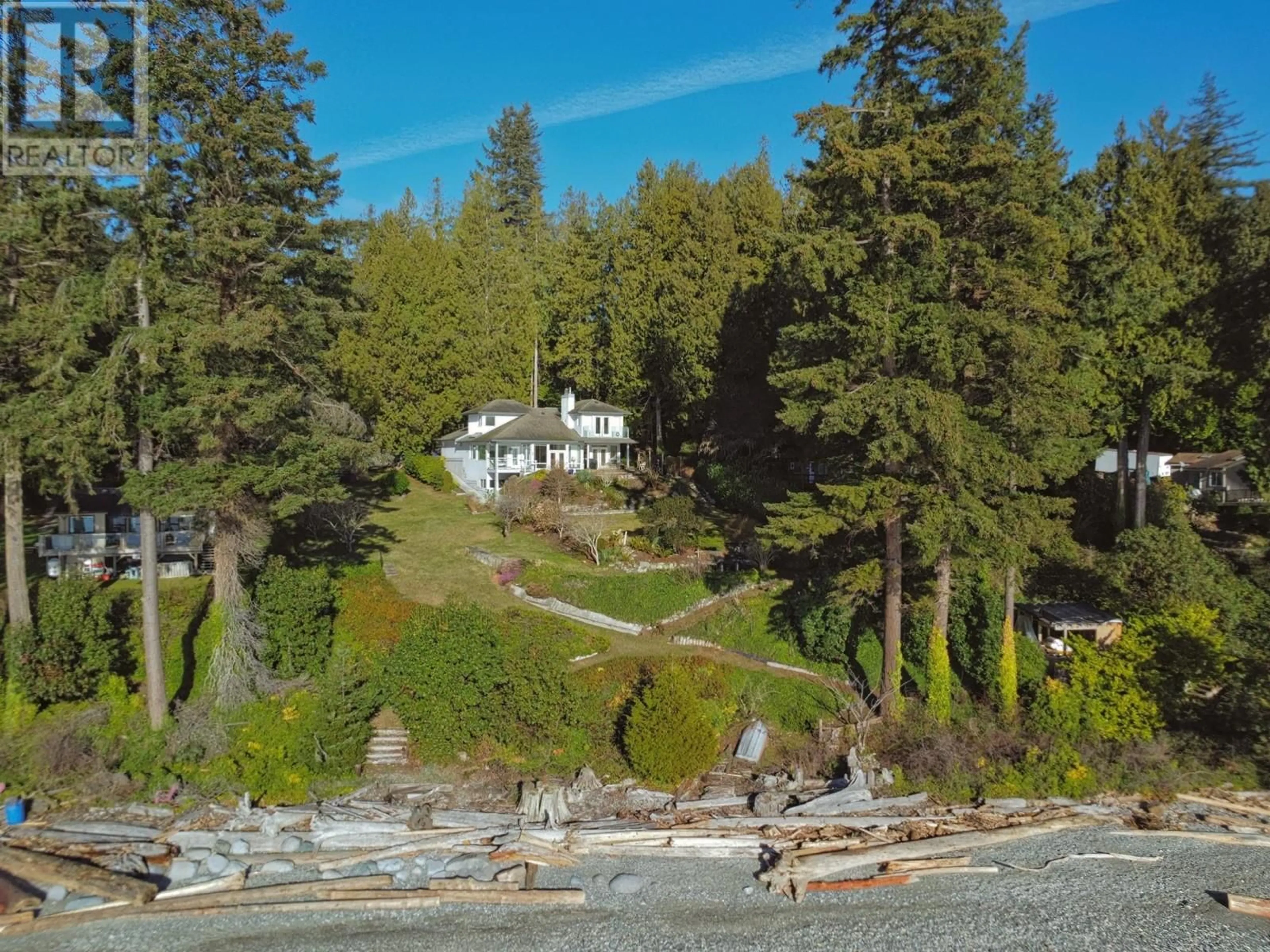 A pic from outside/outdoor area/front of a property/back of a property/a pic from drone, water/lake/river/ocean view for 6417 SUNSHINE COAST HIGHWAY, Sechelt British Columbia V7Z0N6