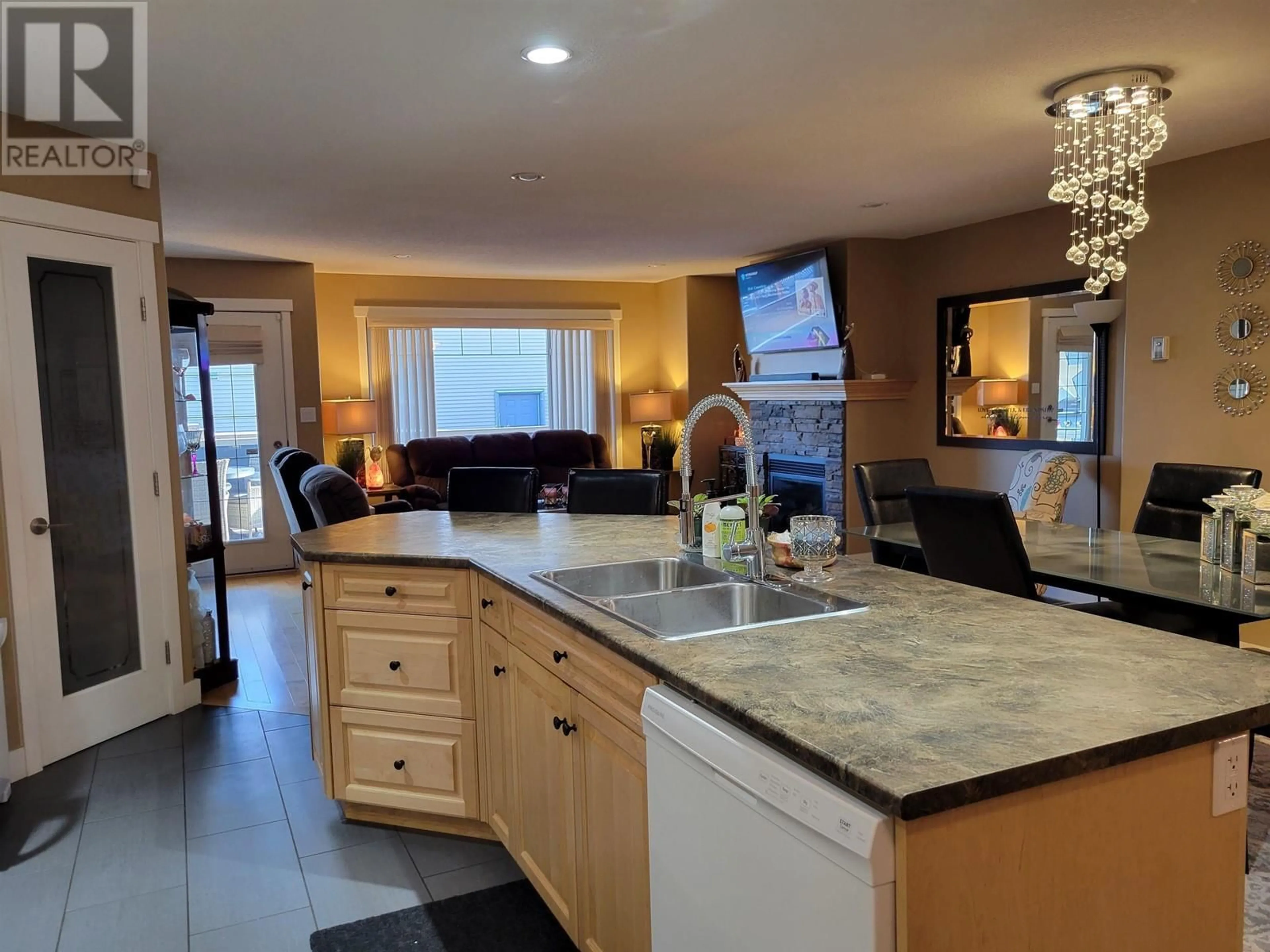 Open concept kitchen, ceramic/tile floor for 102 250 SEYFORTH DRIVE, Vanderhoof British Columbia V0J3A0