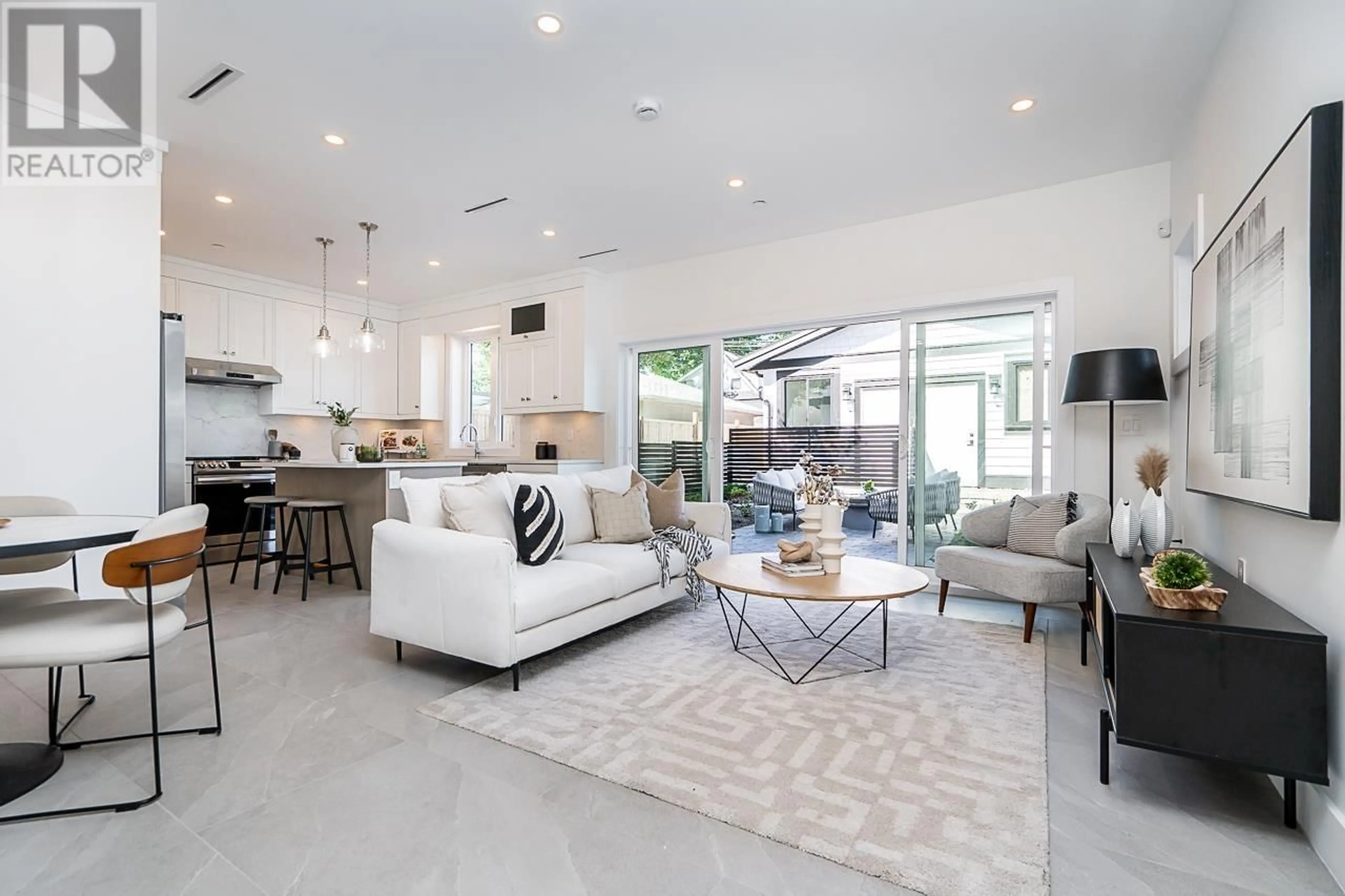 Living room with furniture, ceramic/tile floor for 2 6273 WINDSOR STREET, Vancouver British Columbia V5W3J2