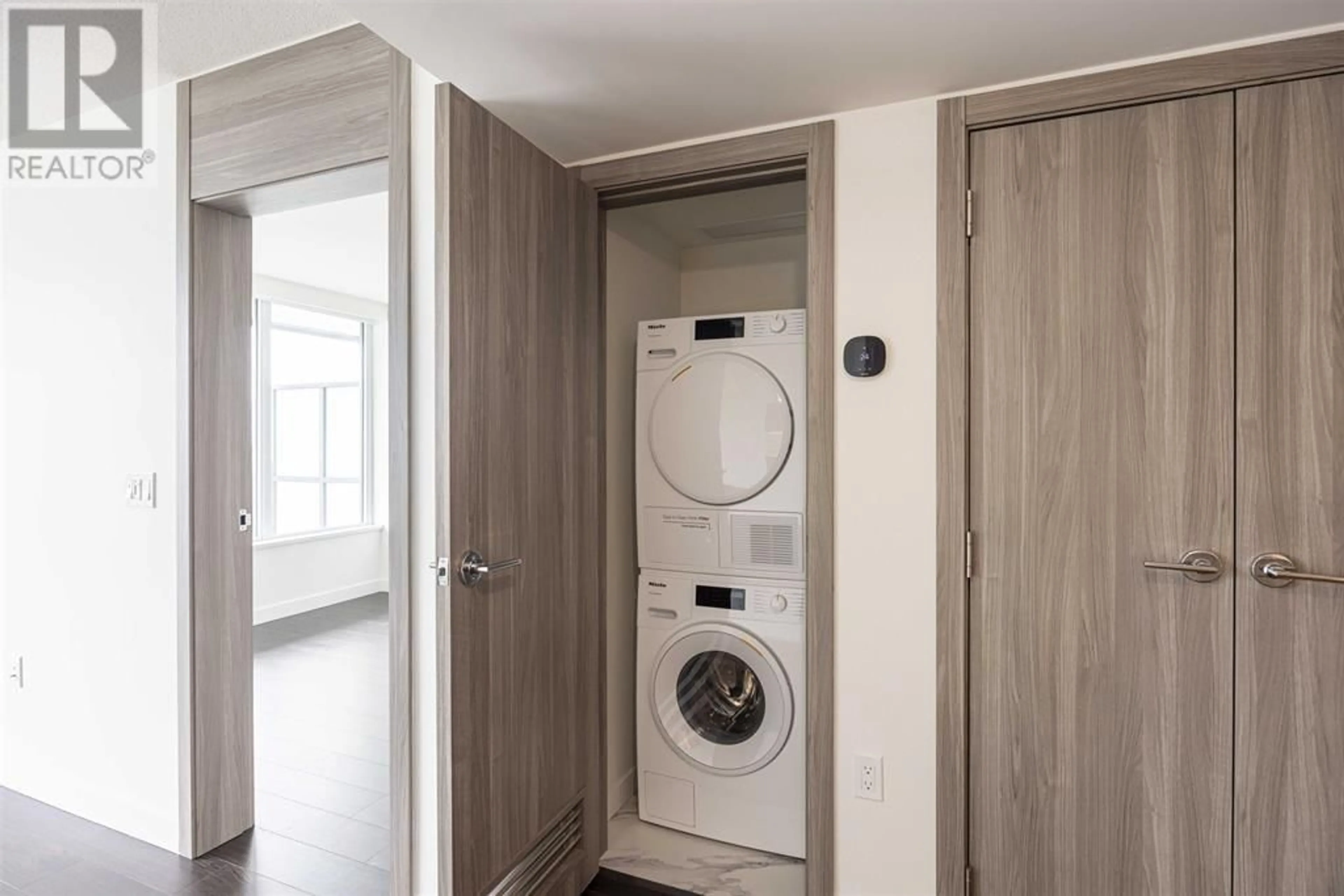 Laundry room for 1006 - 8555 CAPSTAN WAY, Richmond British Columbia V6X0W1