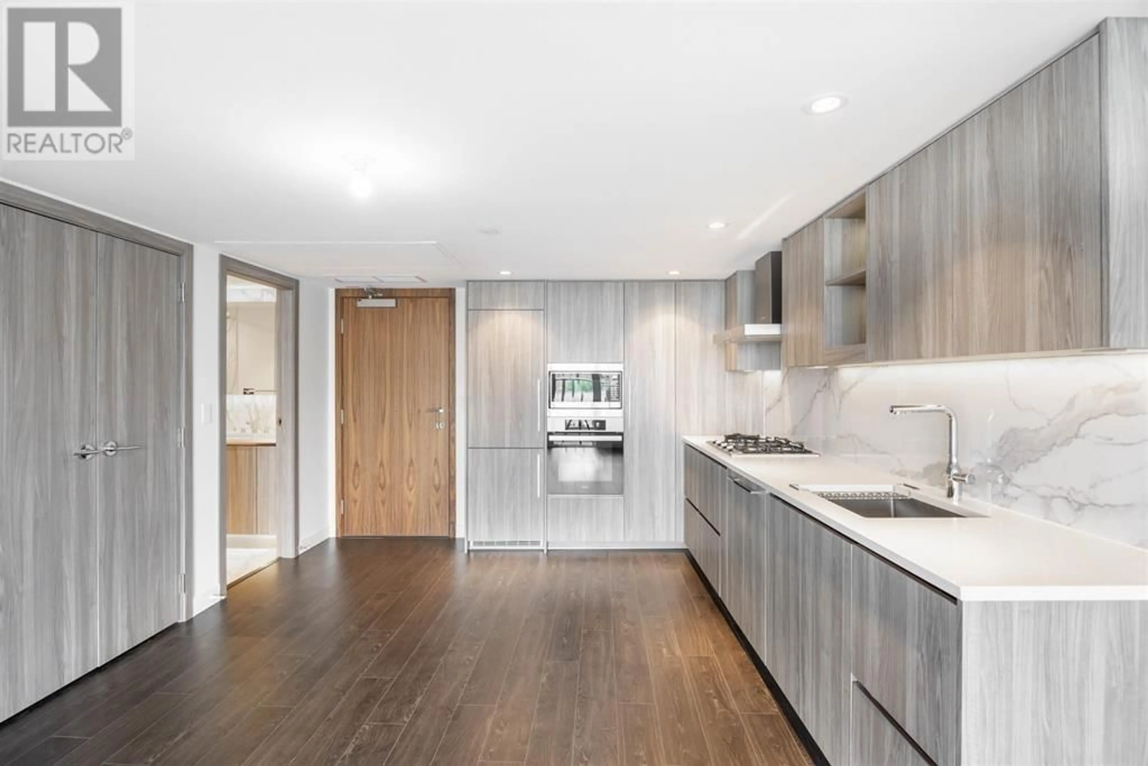 Contemporary kitchen, wood/laminate floor for 1006 8555 CAPSTAN WAY, Richmond British Columbia V6X0W1