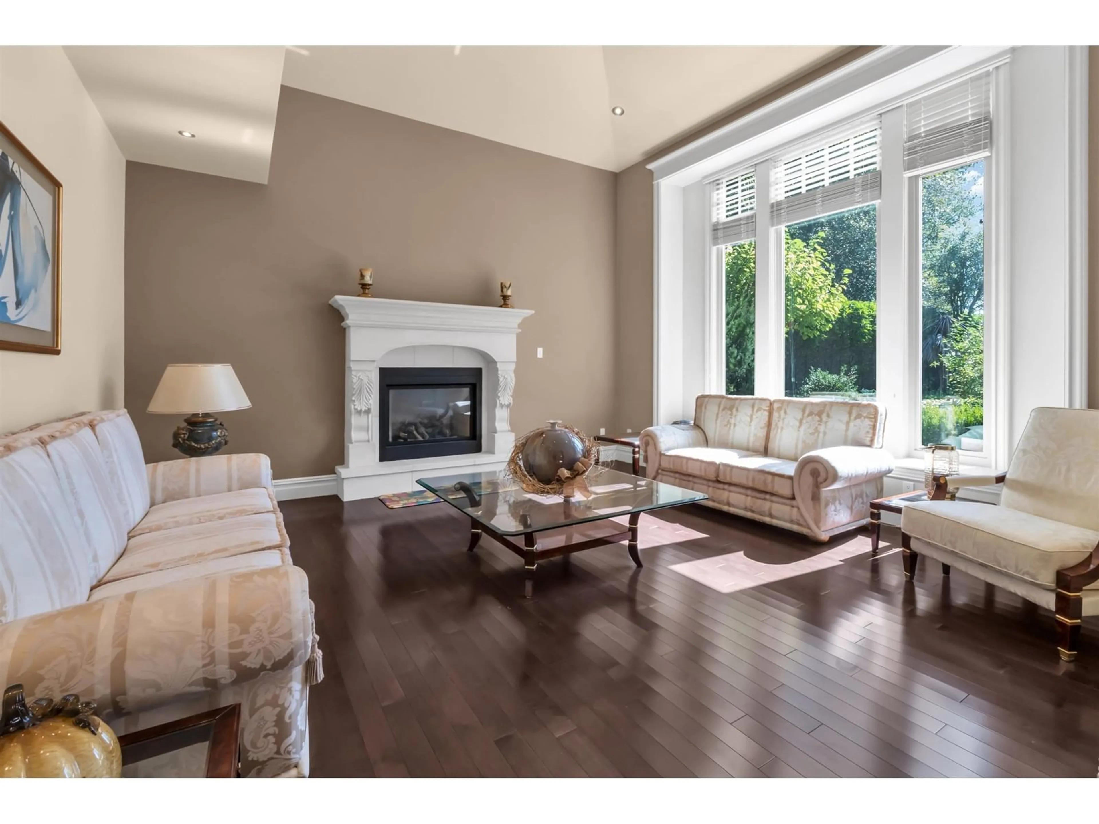 Living room with furniture, wood/laminate floor for 11298 164 STREET, Surrey British Columbia V4N5E1