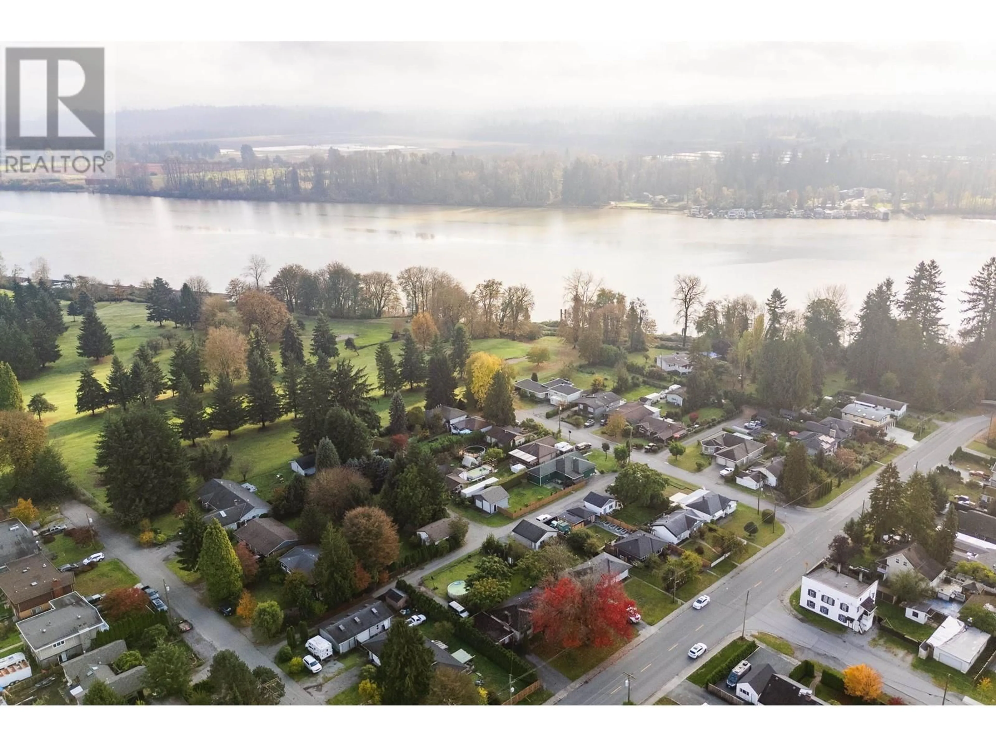 A pic from outside/outdoor area/front of a property/back of a property/a pic from drone, water/lake/river/ocean view for 11312 207 STREET, Maple Ridge British Columbia V2X1W3