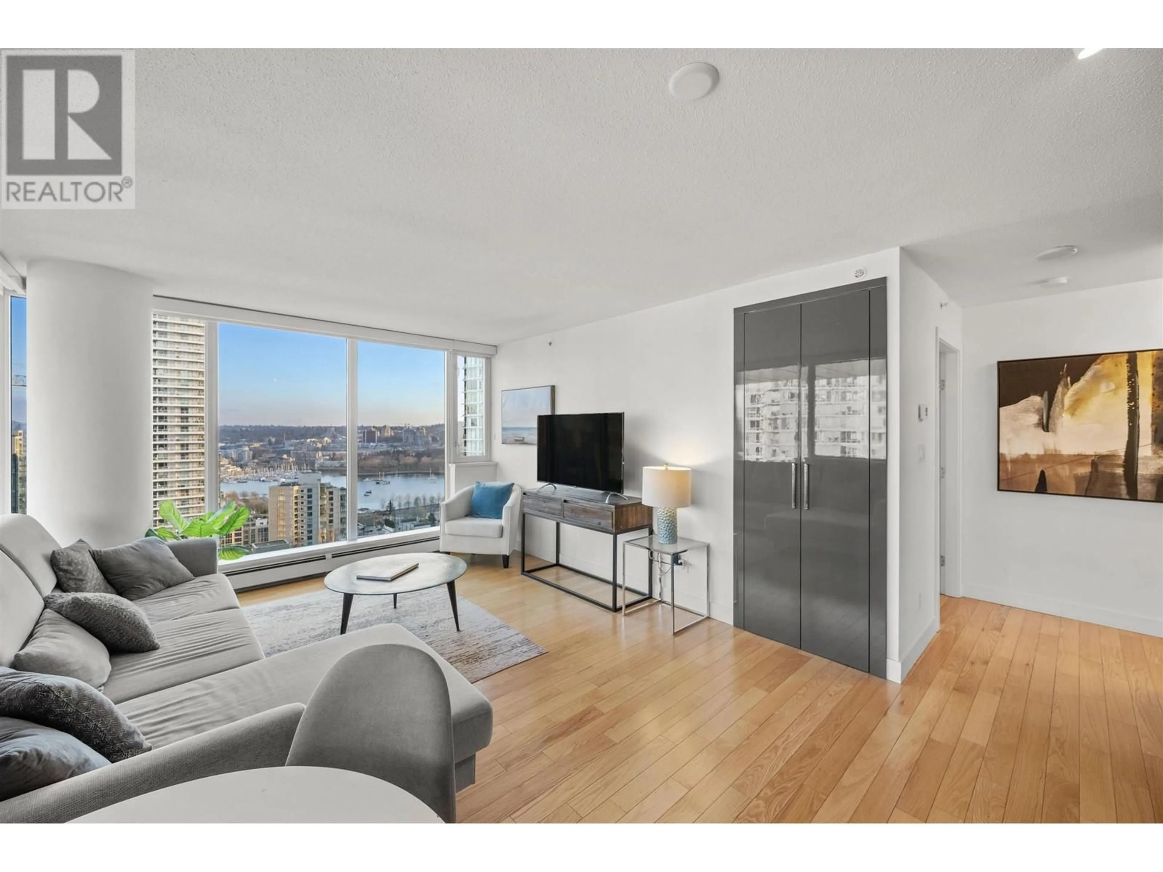 Living room with furniture, wood/laminate floor for 2302 1325 ROLSTON STREET, Vancouver British Columbia V6B0M2