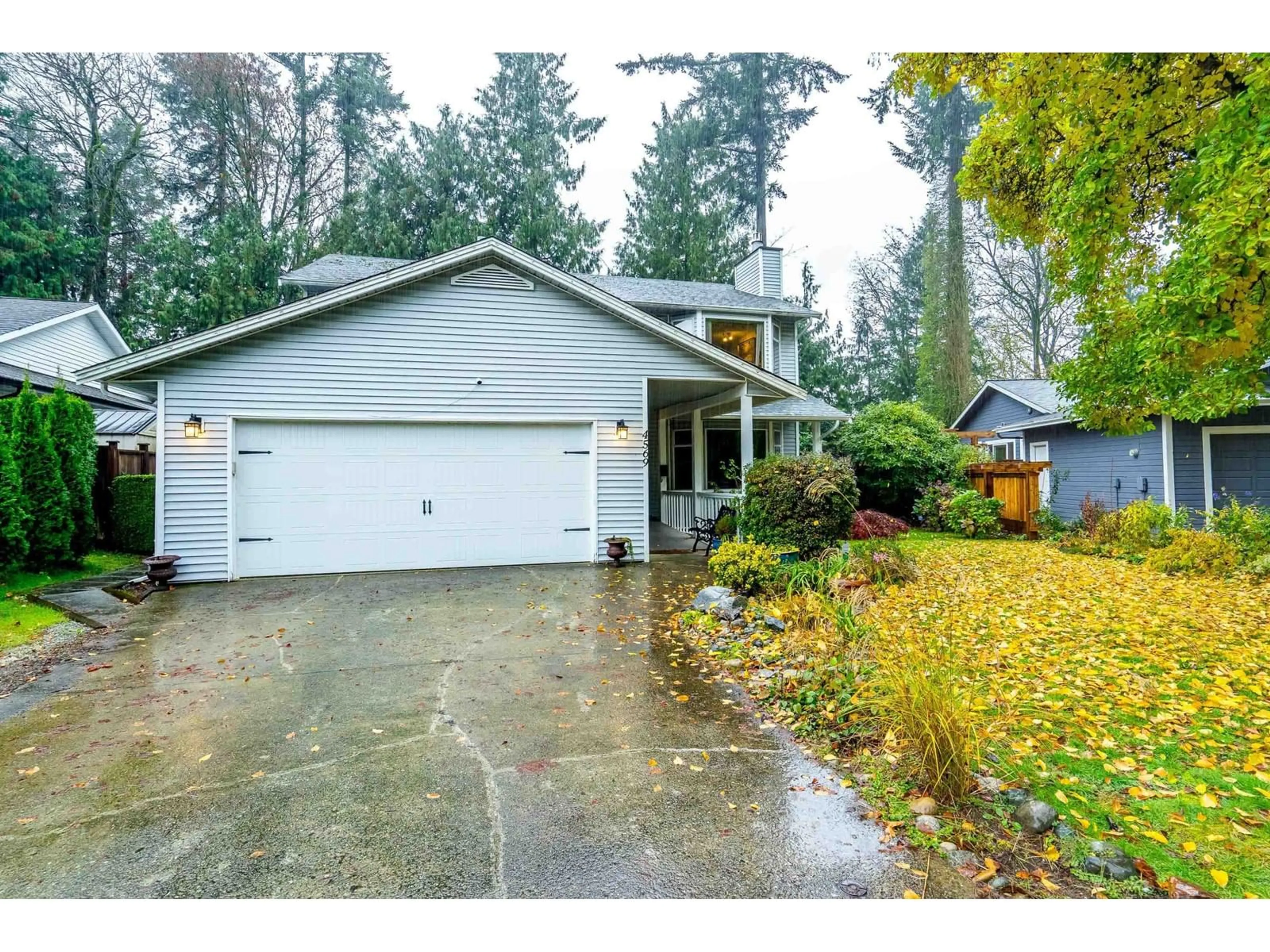 Home with vinyl exterior material, street for 4569 195A STREET, Surrey British Columbia V3Z0L7