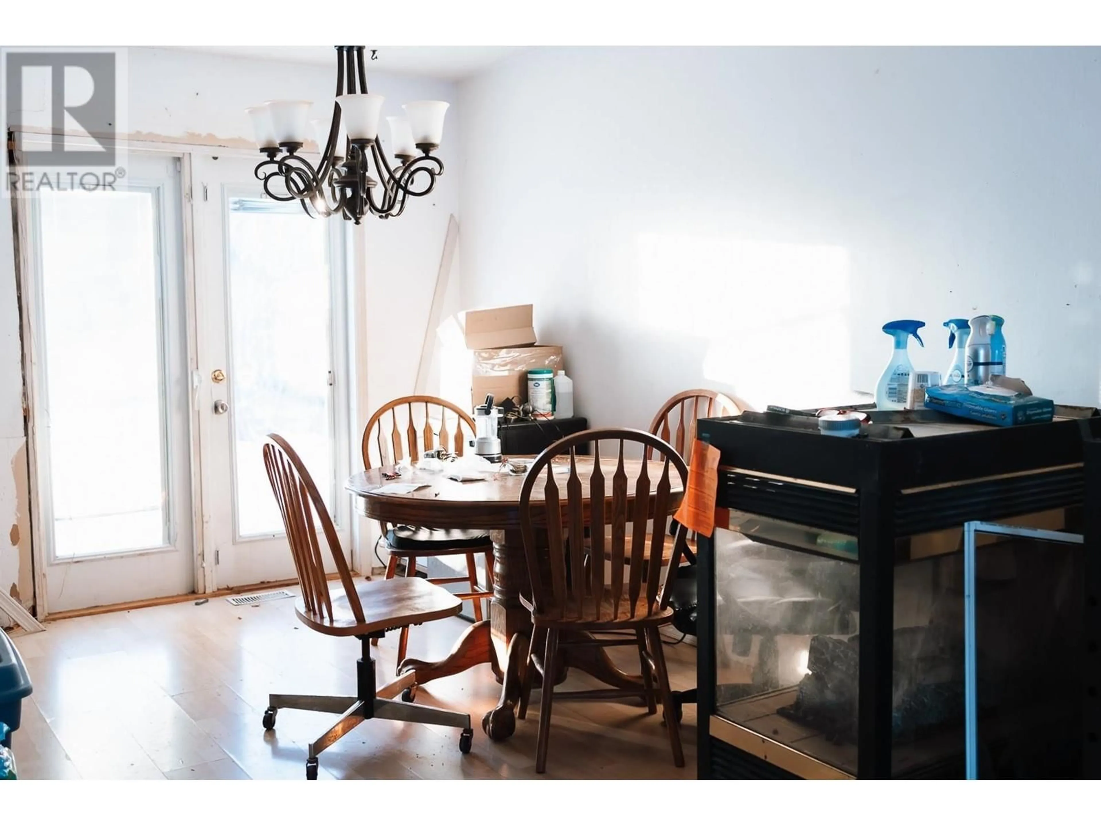 Dining room, wood/laminate floor for 3148 POYNER CRESCENT, Prince George British Columbia V2K1Y1