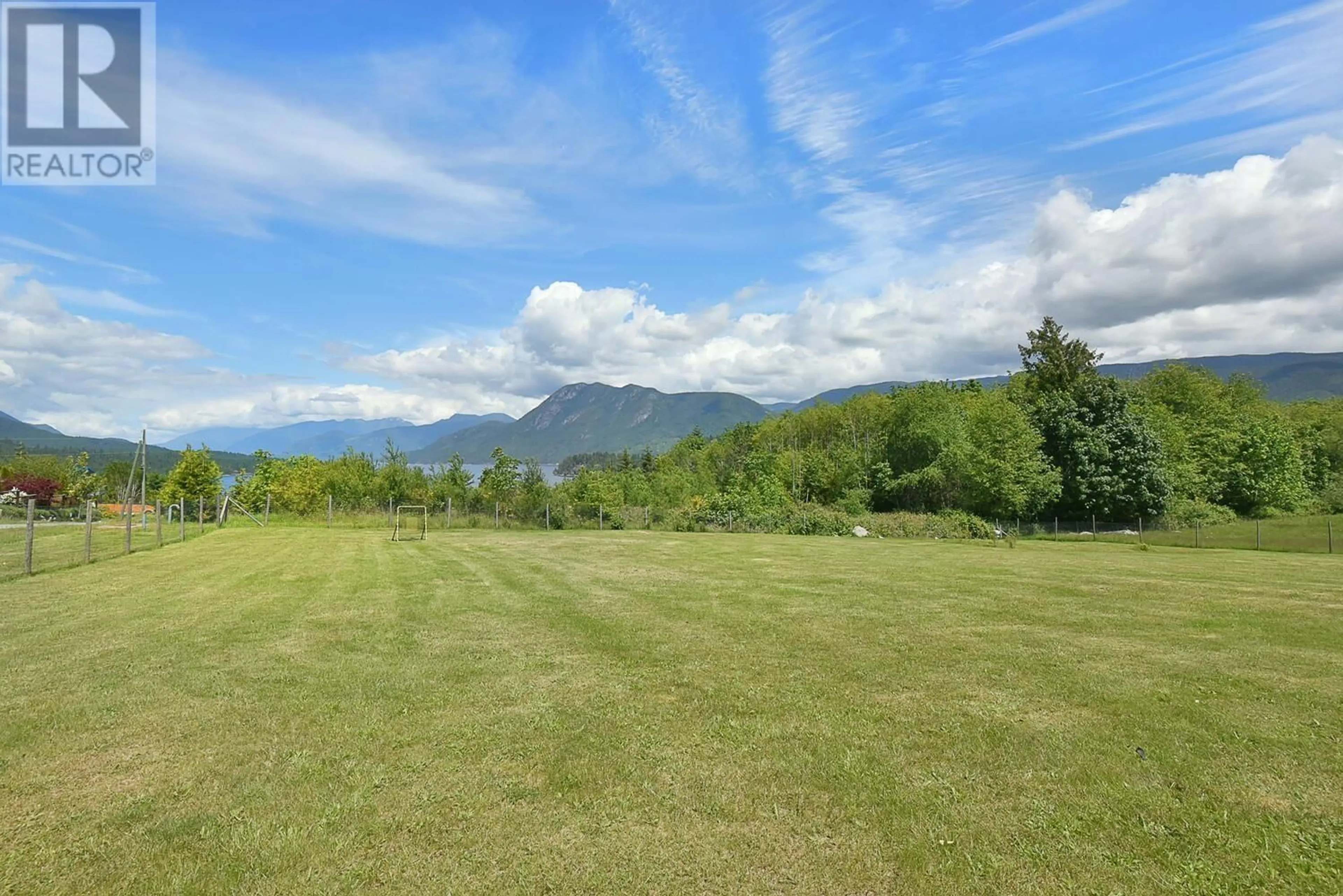 A pic from outside/outdoor area/front of a property/back of a property/a pic from drone, mountain view for 6352 SANDPIPER ROAD, Sechelt British Columbia V7Z0L1