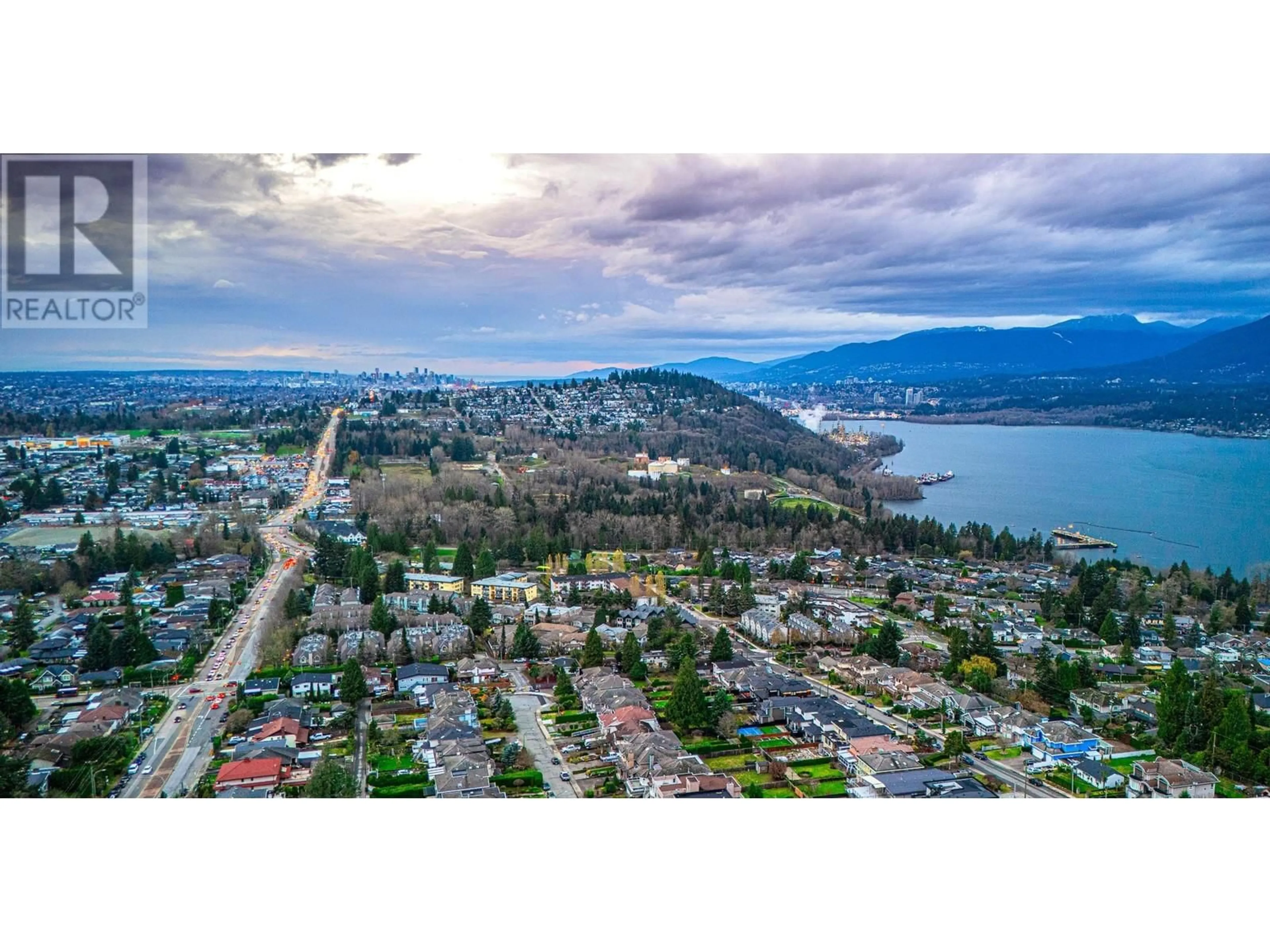 A pic from outside/outdoor area/front of a property/back of a property/a pic from drone, water/lake/river/ocean view for 7370 PANDORA STREET, Burnaby British Columbia V5A1B9