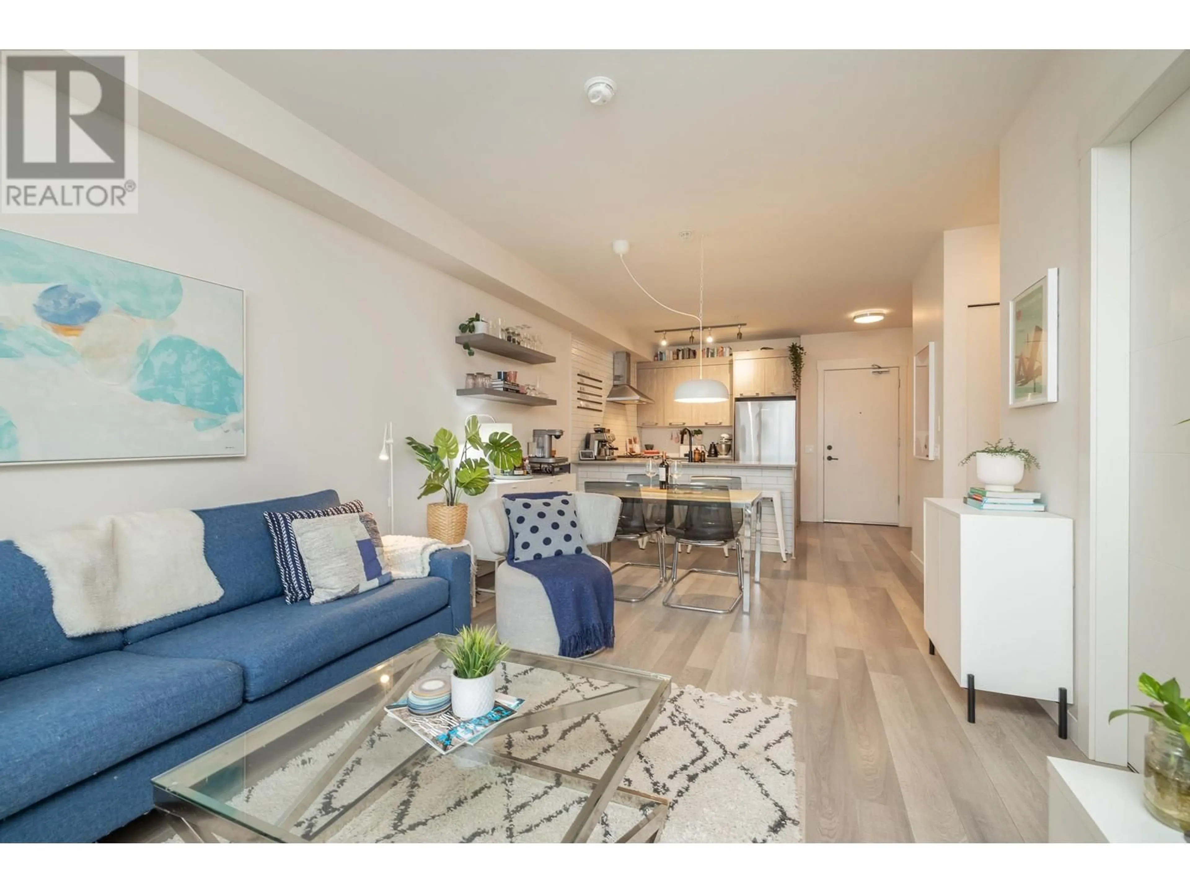 Living room with furniture, wood/laminate floor for 206 1012 AUCKLAND STREET, New Westminster British Columbia V3M0M3