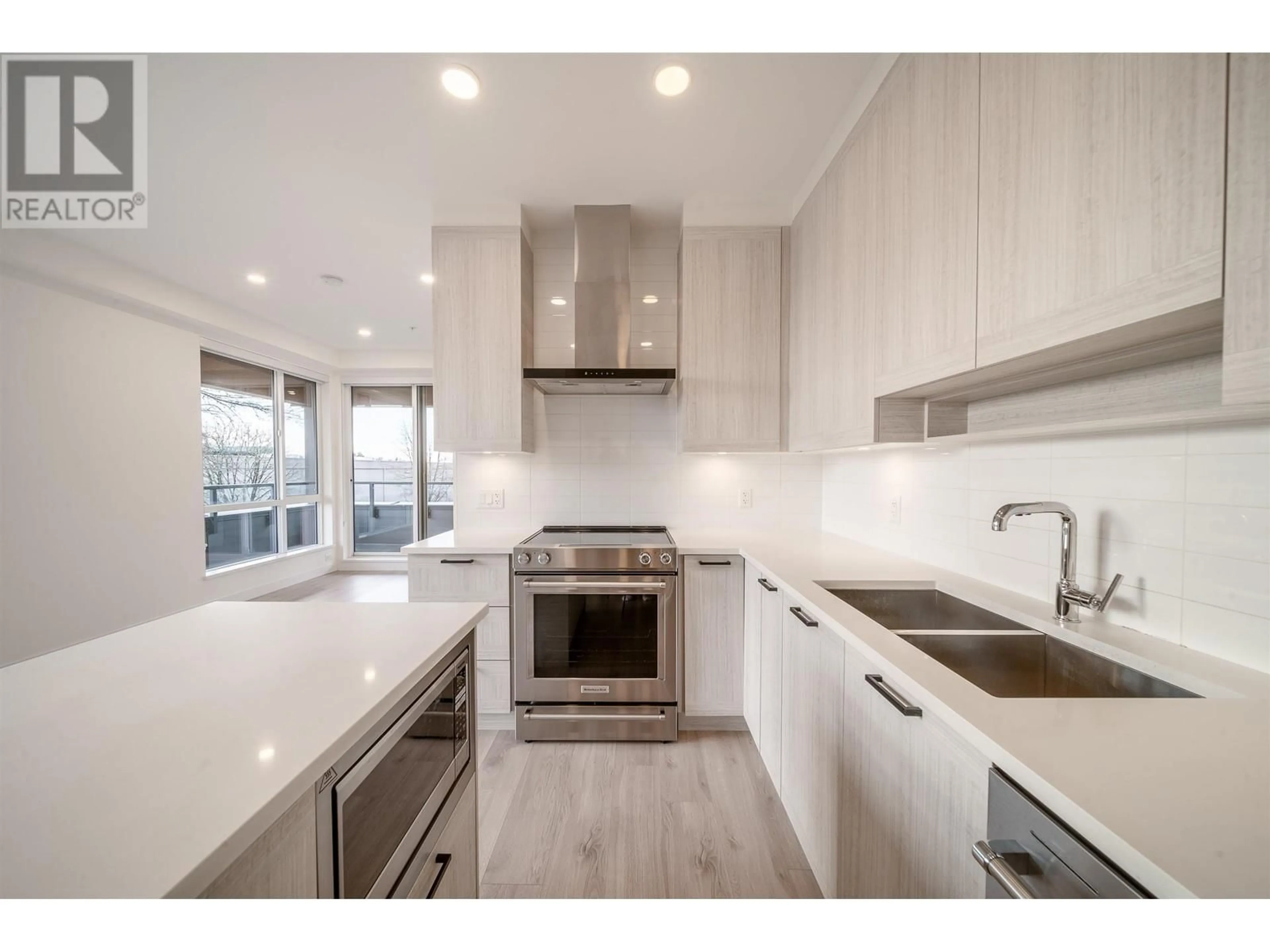 Open concept kitchen, ceramic/tile floor for 411 7169 14TH AVENUE, Burnaby British Columbia V3N0H6