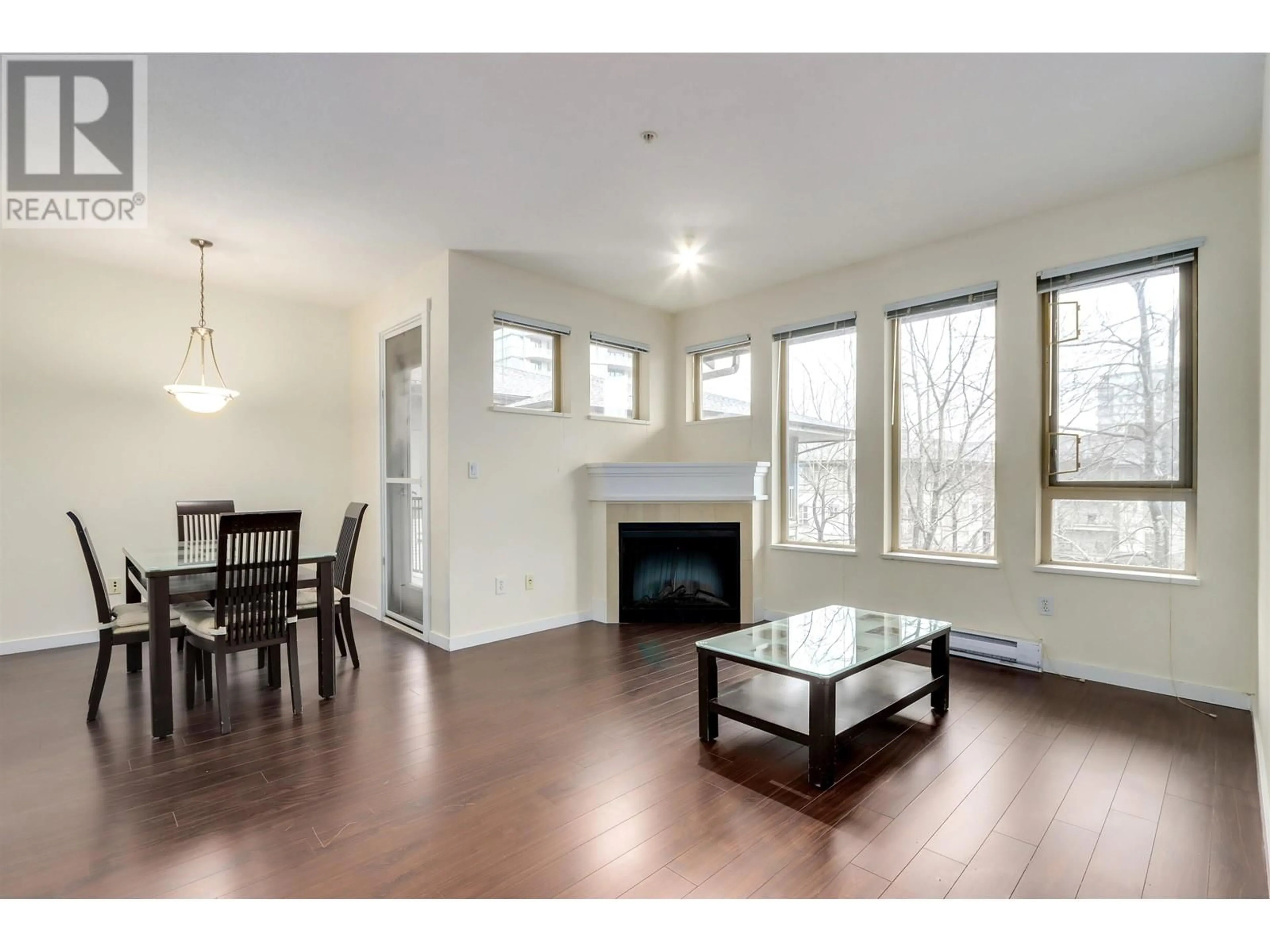 Living room with furniture, wood/laminate floor for 1401 5133 GARDEN CITY ROAD, Richmond British Columbia V6X4H9