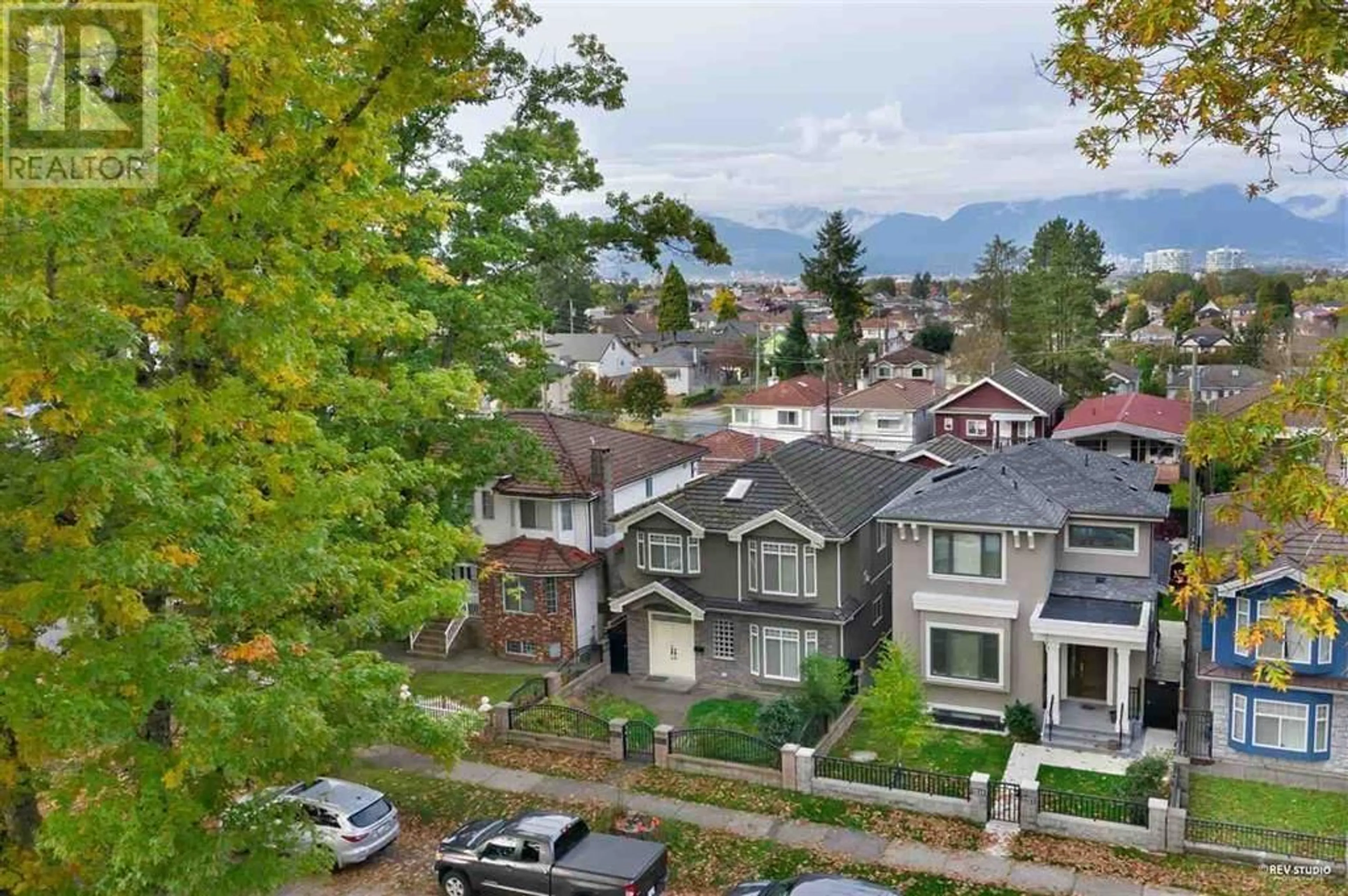 A pic from outside/outdoor area/front of a property/back of a property/a pic from drone, mountain view for 2211 E 43RD AVENUE, Vancouver British Columbia V5P1M8