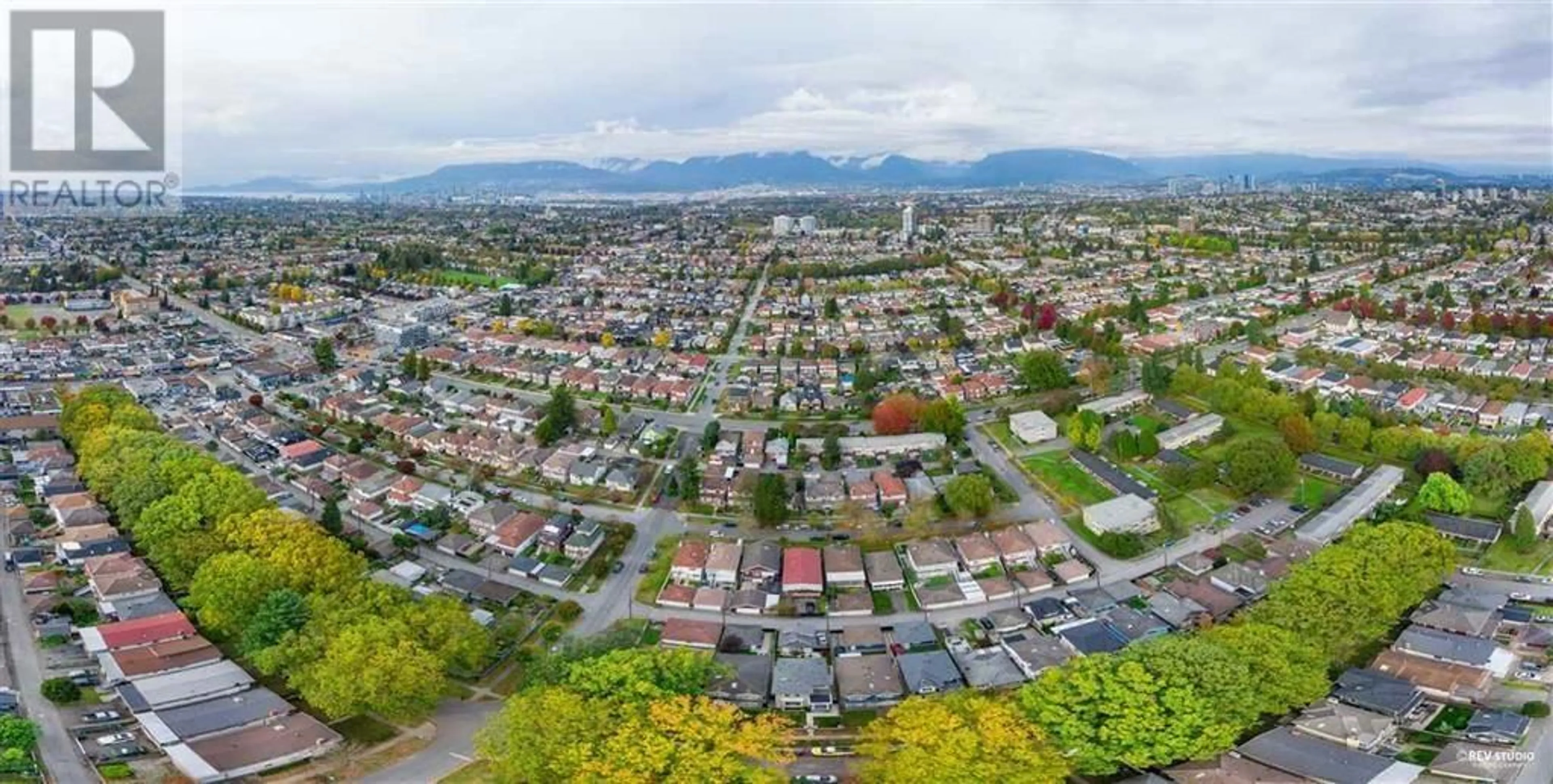 A pic from outside/outdoor area/front of a property/back of a property/a pic from drone, mountain view for 2211 E 43RD AVENUE, Vancouver British Columbia V5P1M8