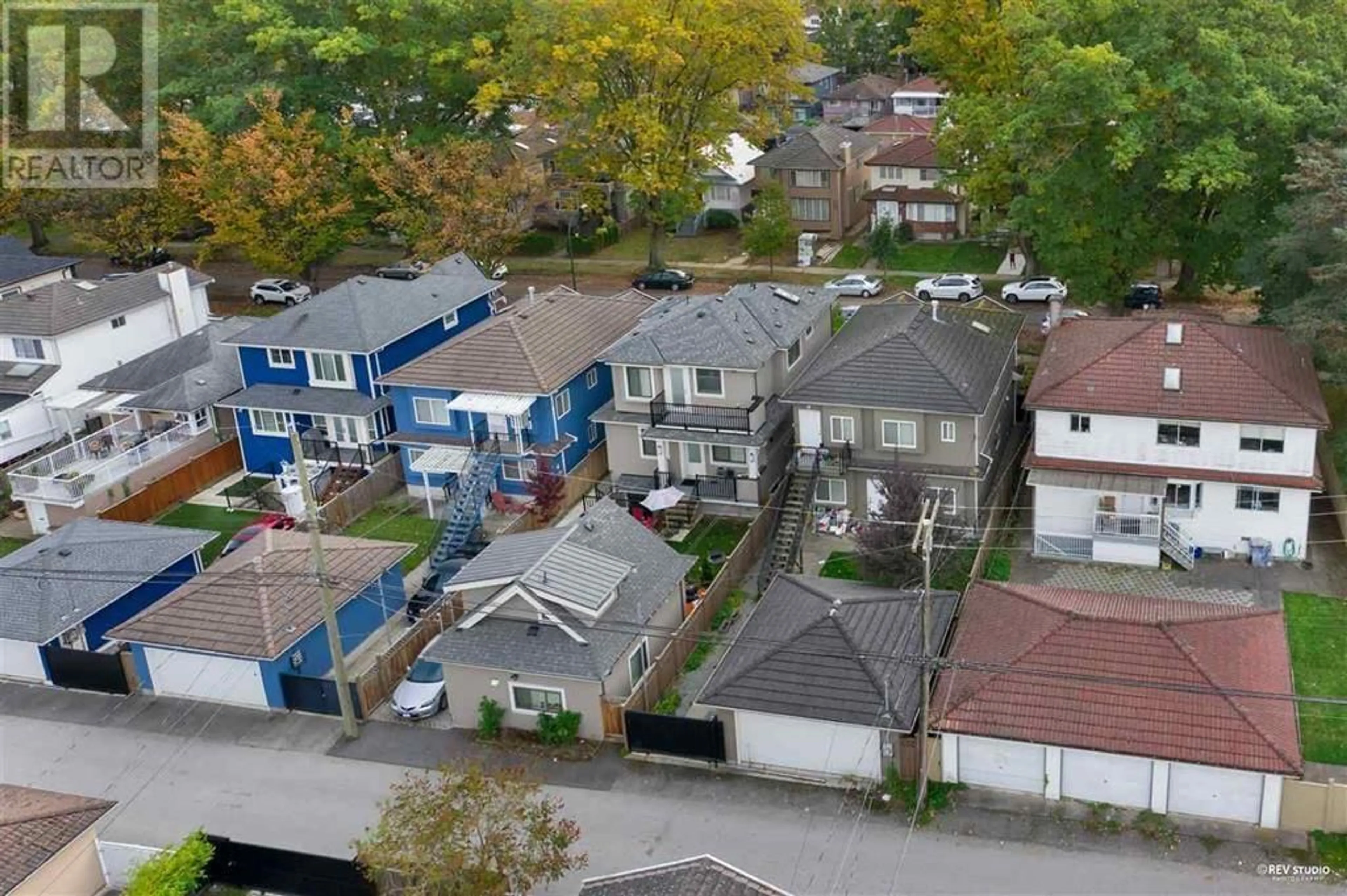 A pic from outside/outdoor area/front of a property/back of a property/a pic from drone, street for 2211 E 43RD AVENUE, Vancouver British Columbia V5P1M8