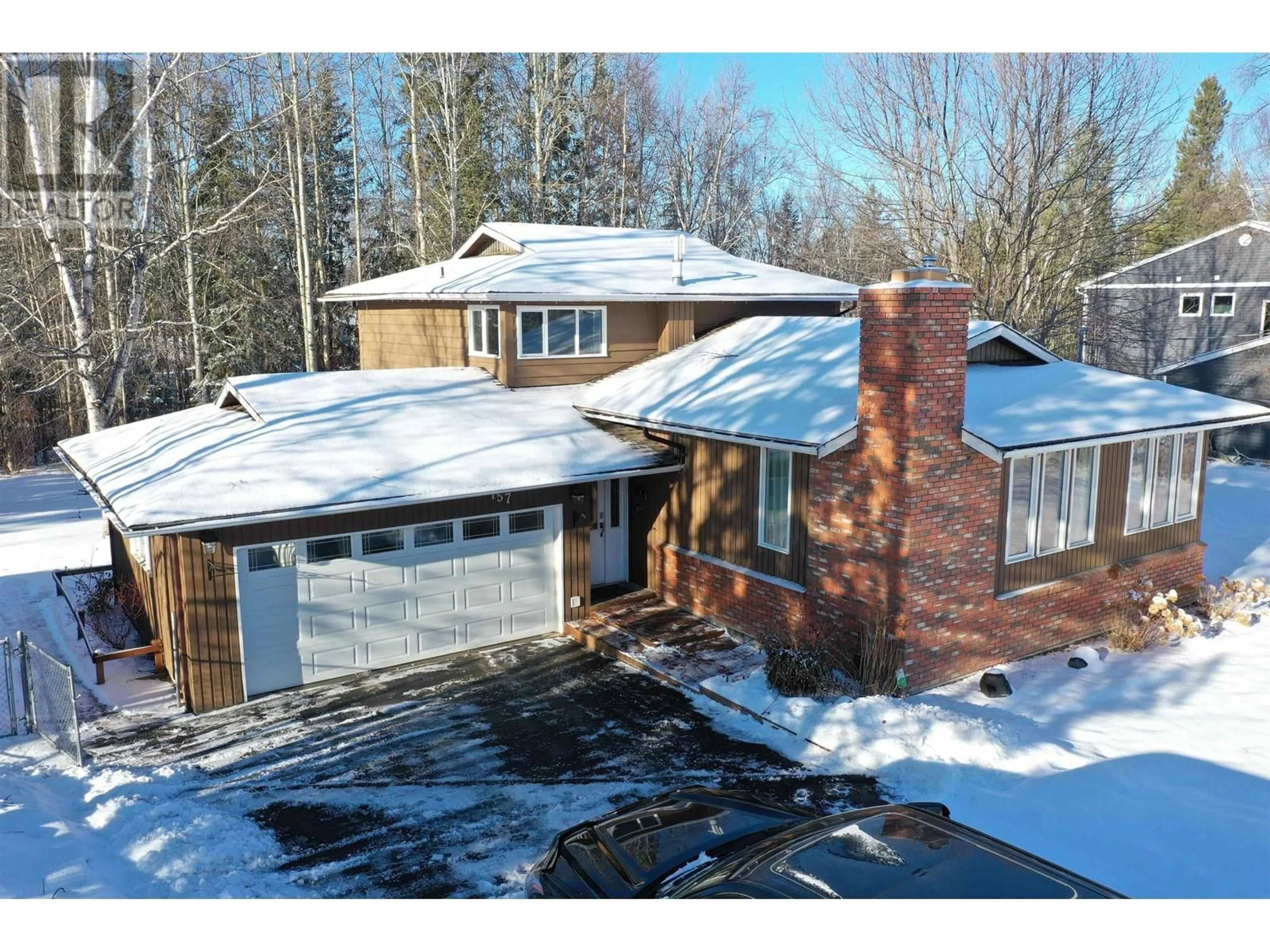 A pic from outside/outdoor area/front of a property/back of a property/a pic from drone, street for 157 THOMPSON ROAD, Quesnel British Columbia V2J5B5