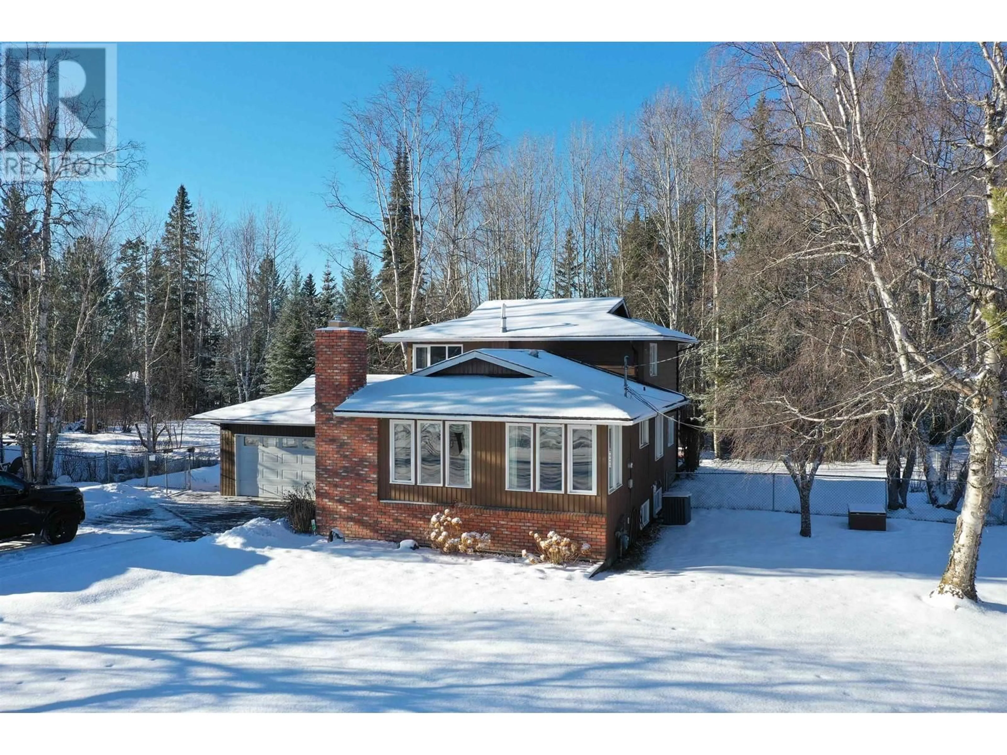 A pic from outside/outdoor area/front of a property/back of a property/a pic from drone, street for 157 THOMPSON ROAD, Quesnel British Columbia V2J5B5