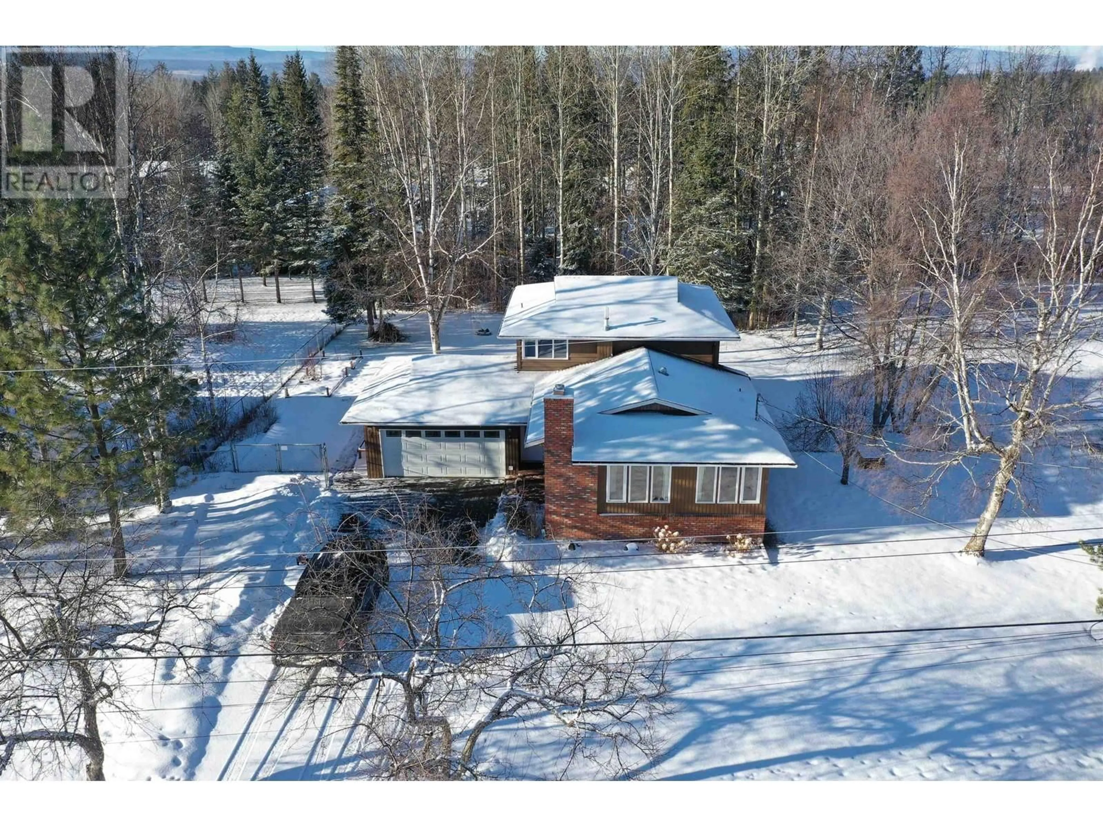 A pic from outside/outdoor area/front of a property/back of a property/a pic from drone, street for 157 THOMPSON ROAD, Quesnel British Columbia V2J5B5