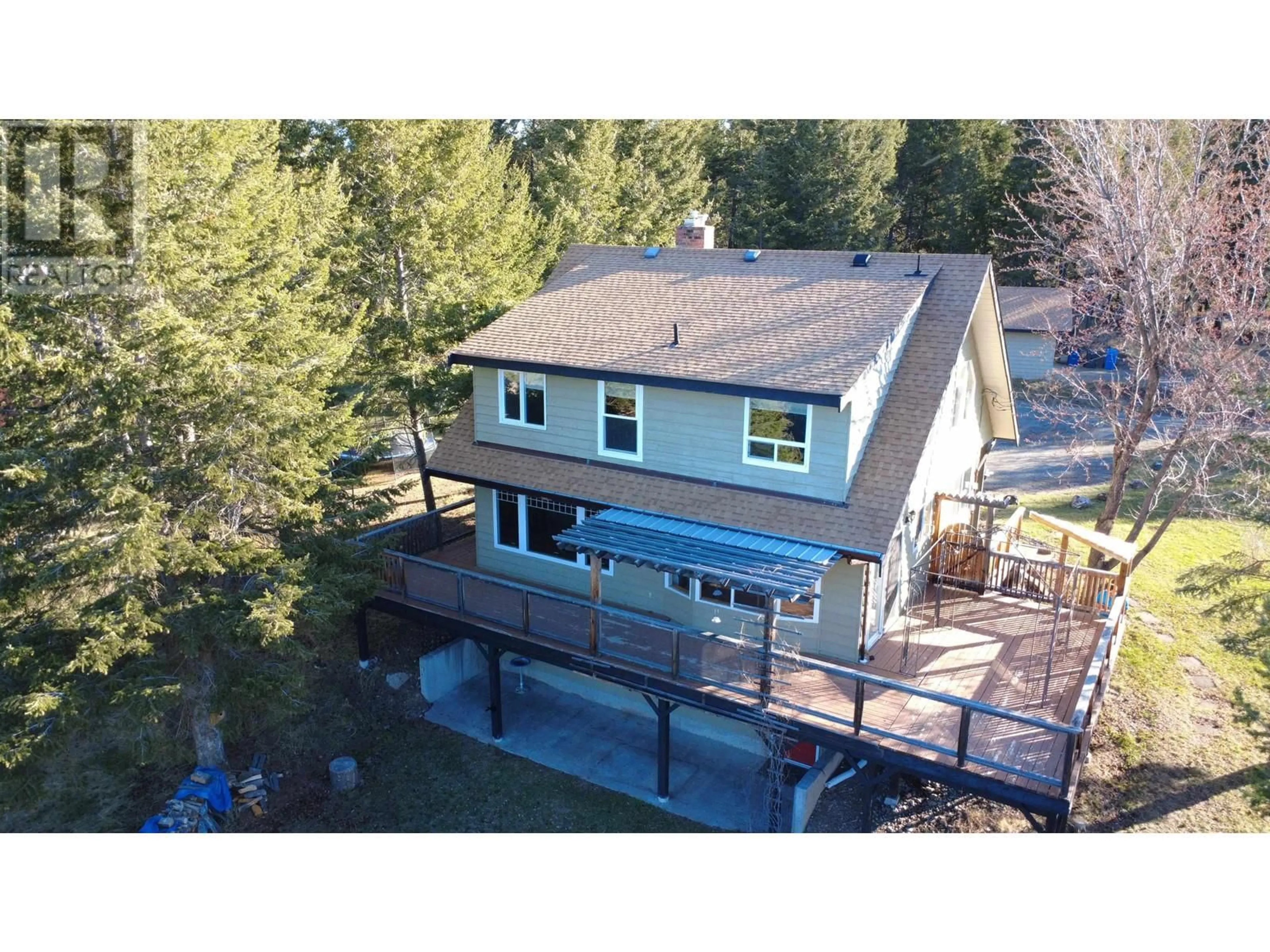 A pic from outside/outdoor area/front of a property/back of a property/a pic from drone, water/lake/river/ocean view for 5012 BLOCK DRIVE, 108 Mile Ranch British Columbia V0K2Z0